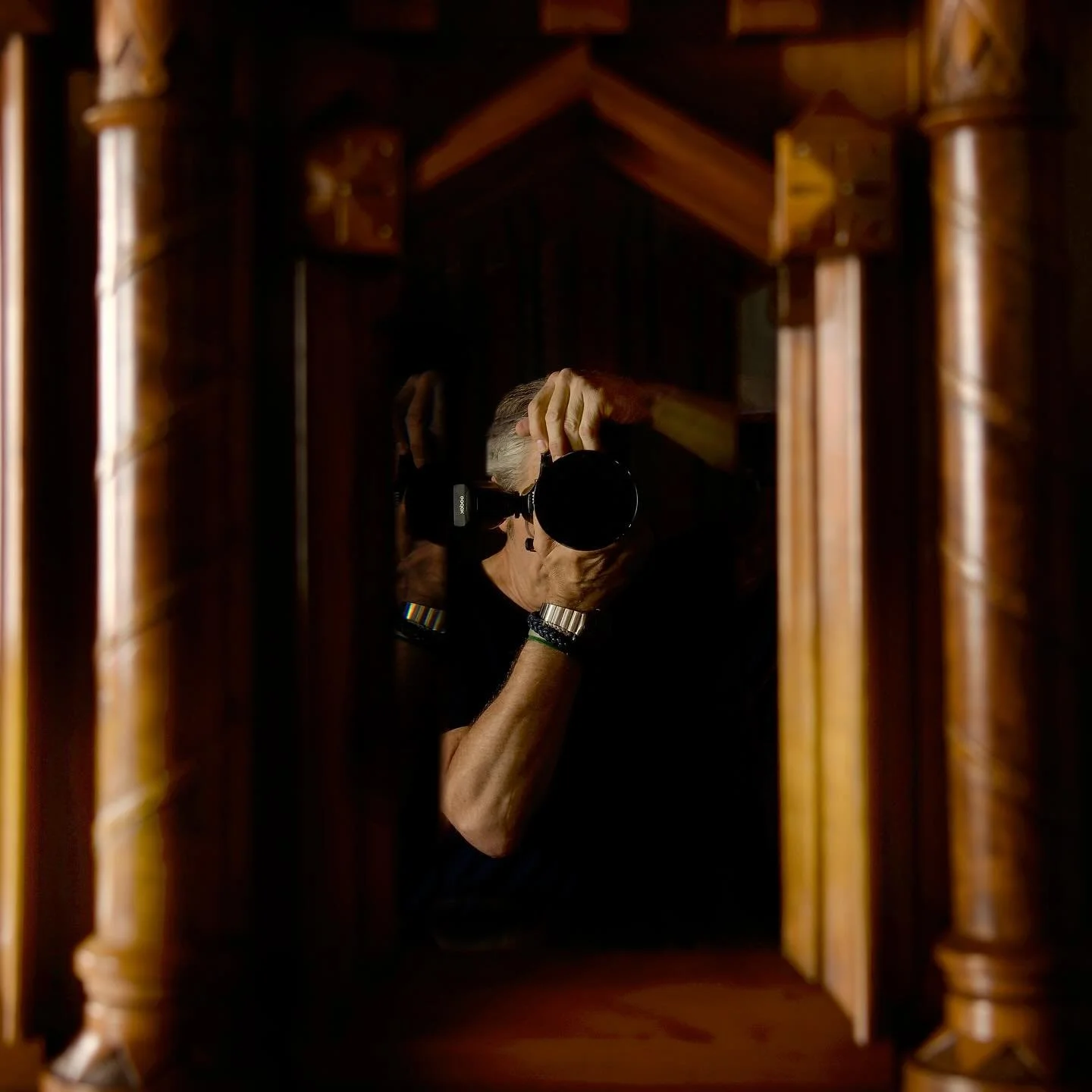 ::::CLICK:::: My unexpected cameo in the glass while shooting an impressive and historic piece of furniture that resides in the governor&rsquo;s office suite in the Michigan Capitol building.  Coming soon-ish to a website or a bookstore near you.  Or