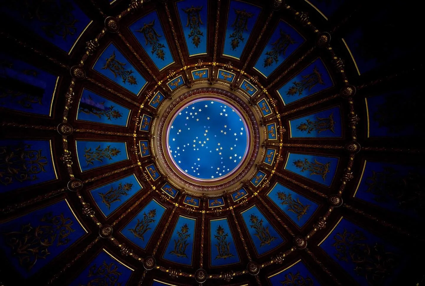 Perhaps you&rsquo;ve seen Michigan&rsquo;s gorgeous Capitol rotunda at some point.  Most of the time we see hues of orange, yellow, mustard, blue, gold, silver, bits of red, and a gradient greenish blue when we look up towards the dome&rsquo;s star-s