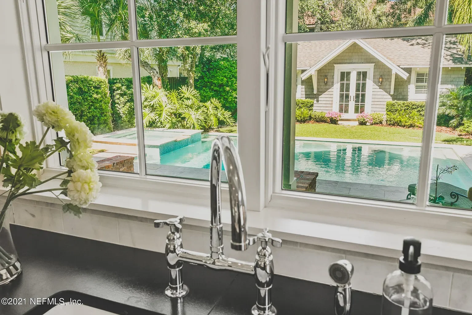 beach ave kitchen and pool.webp