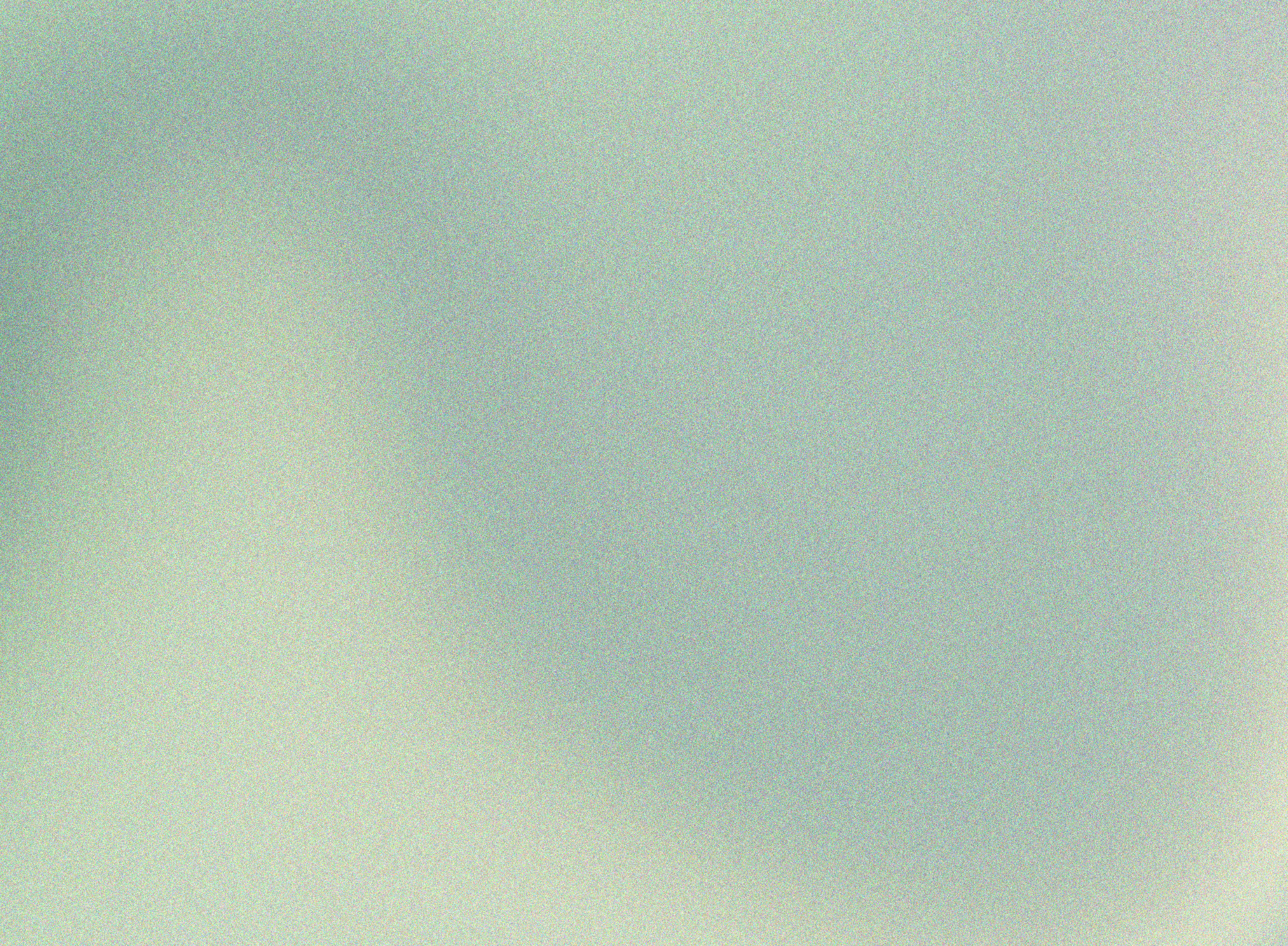 A pixelated, multicolored abstract background with shades of green, blue, and beige blending together.