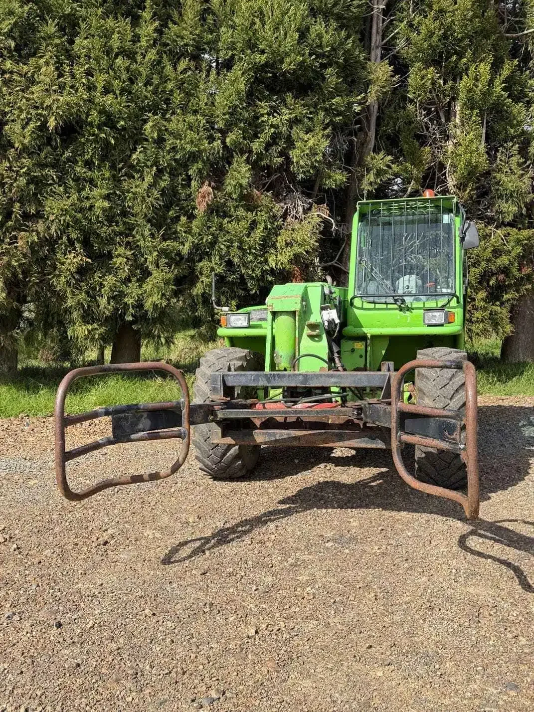 Merlo P34.7 telehandler fitted with hydraulic bale grab
