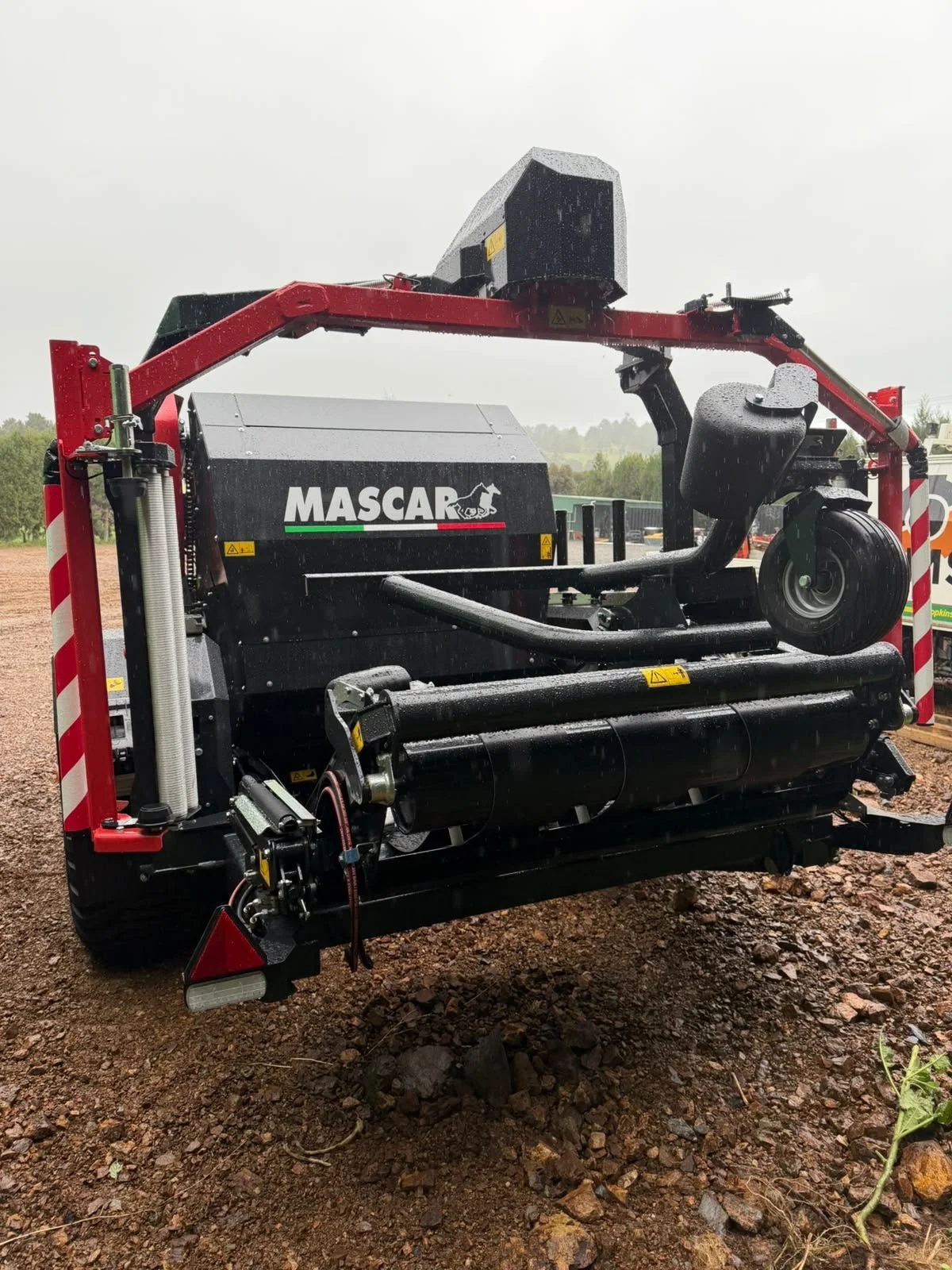 A large black and red machine with the word