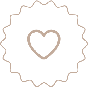 A black badge with a beige heart in the center and a beige wavy border