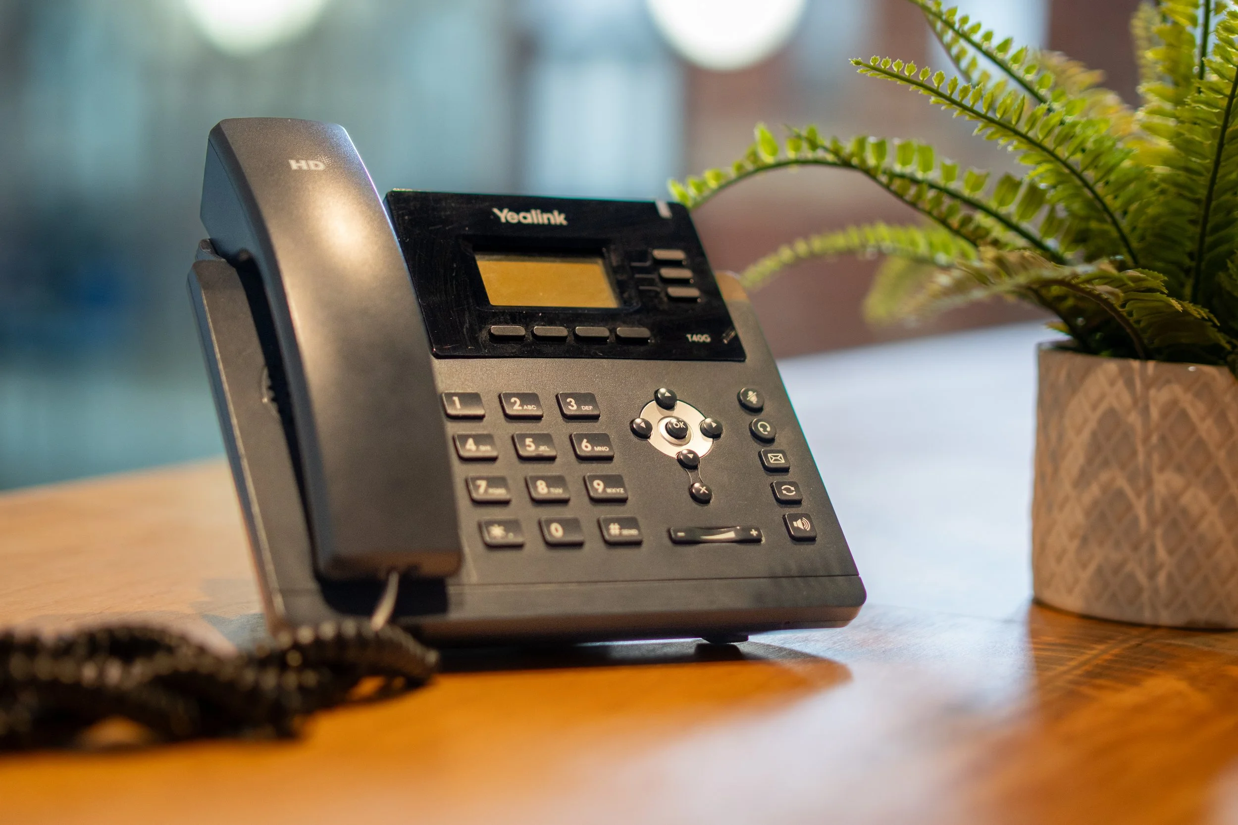 Photo of an office telephone on a desk
