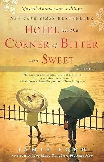 Book cover of "Hotel on the Corner of Bitter and Sweet" by Jamie Ford, featuring two children holding umbrellas on a waterfront with a fence, in a sepia tone.