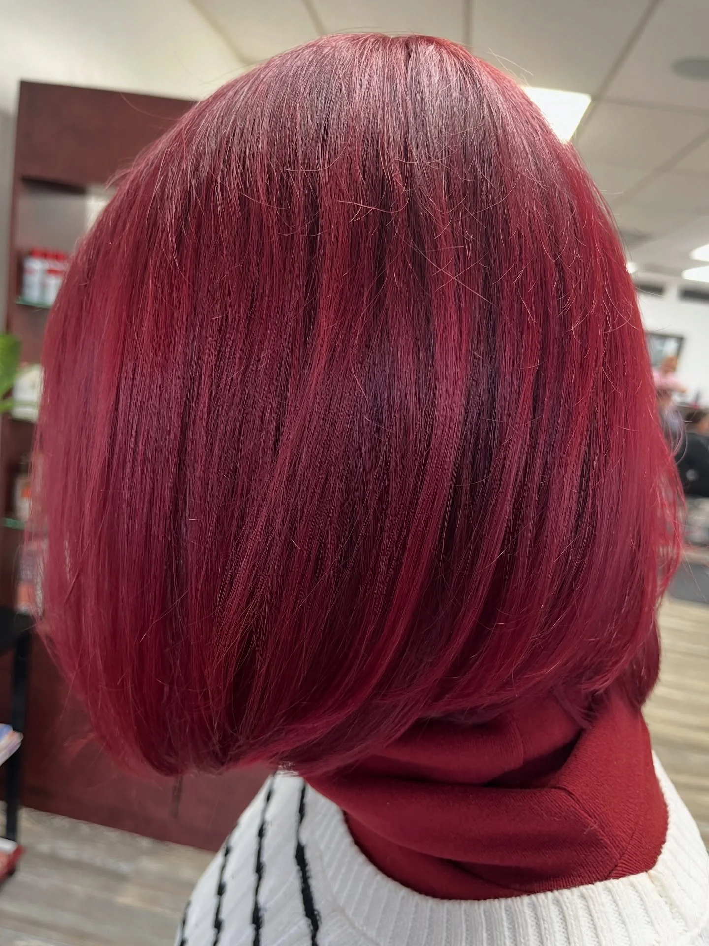 Velvet raspberry red 🍒✨ Bold, glossy, and full of berry-rich dimension. This vibrant red catches the light from every angle&mdash;perfect for anyone ready to turn heads. ❤️💇&zwj;♀️ #RedHair #BerryRed #HairColorGo
:::