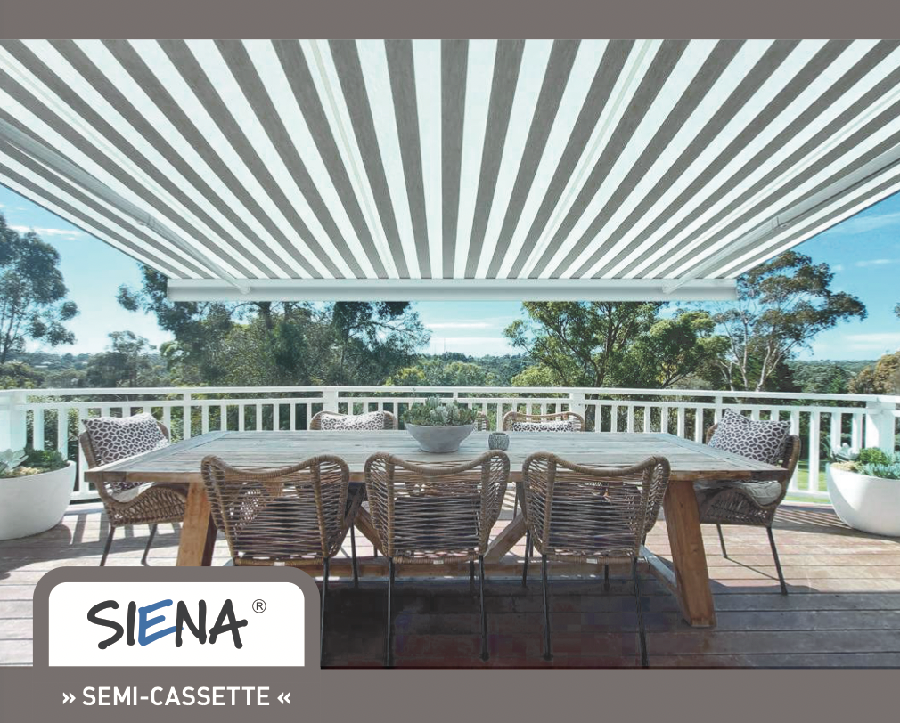 Outdoor dining table with six chairs on a covered deck overlooking trees and a blue sky.