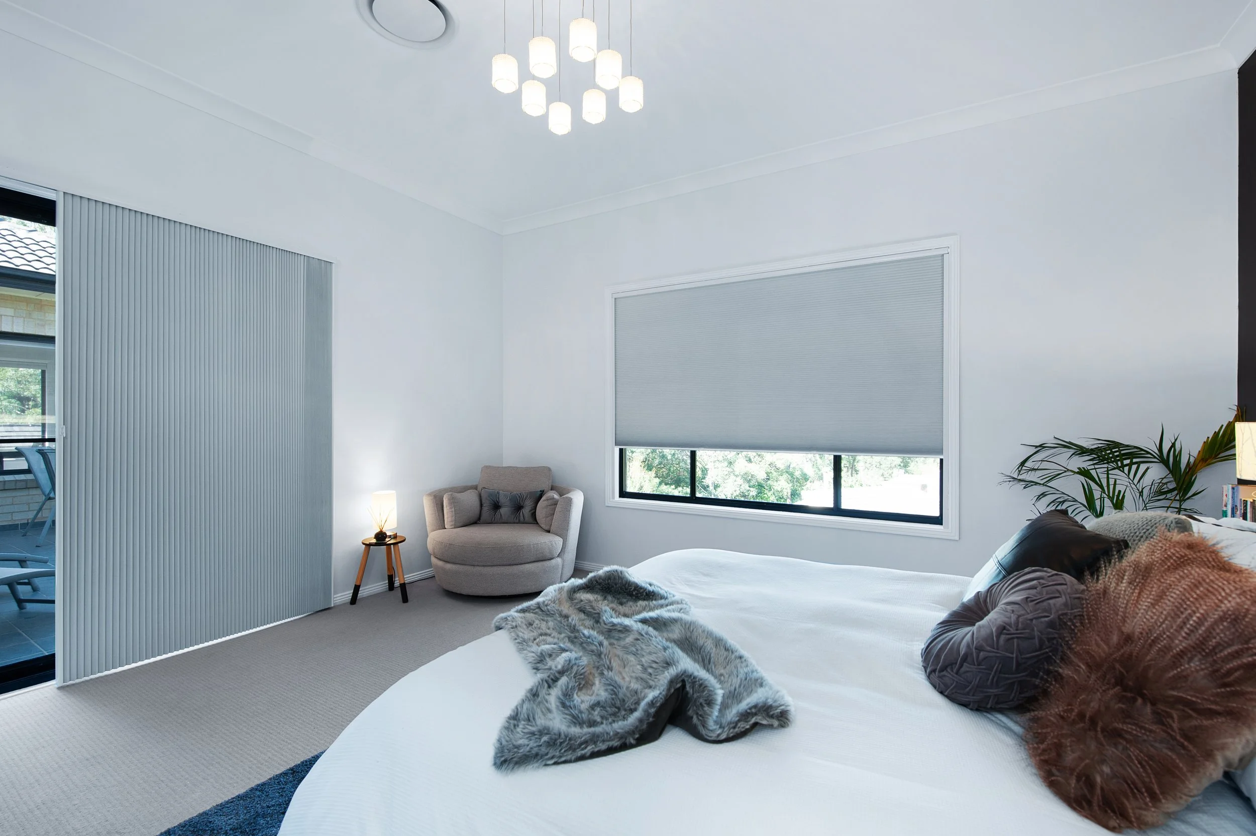 Honeycomb blinds by Evans Curtains and Blinds fitted to a modern bedroom window.