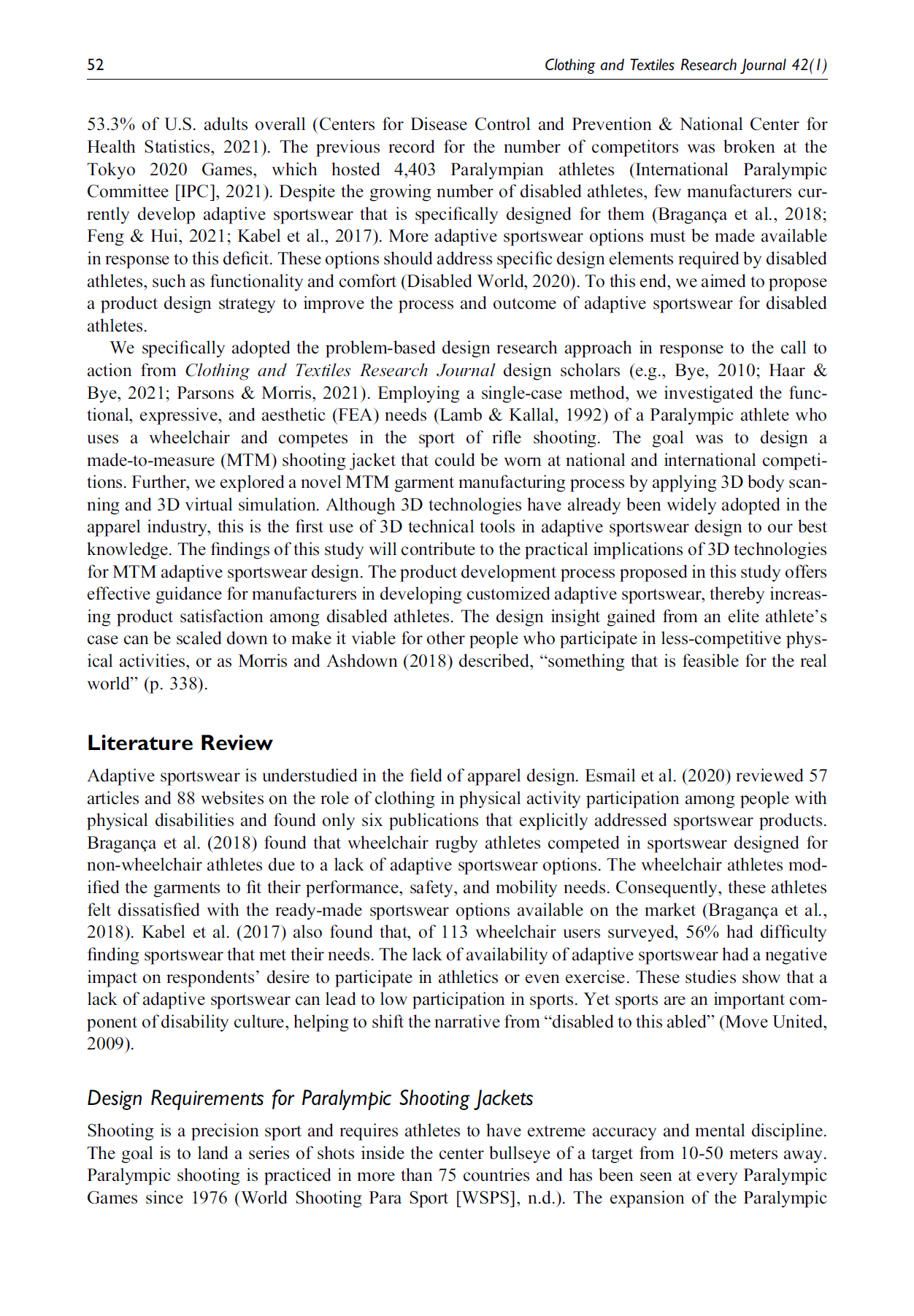 Photograph of a printed research journal page discussing adaptive sportswear and wheelchair athletes, with sections on literature review and design requirements for Paralympic shooting jackets.