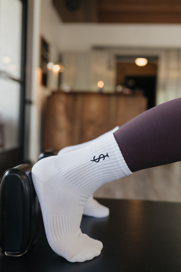 white socks brown leg.png