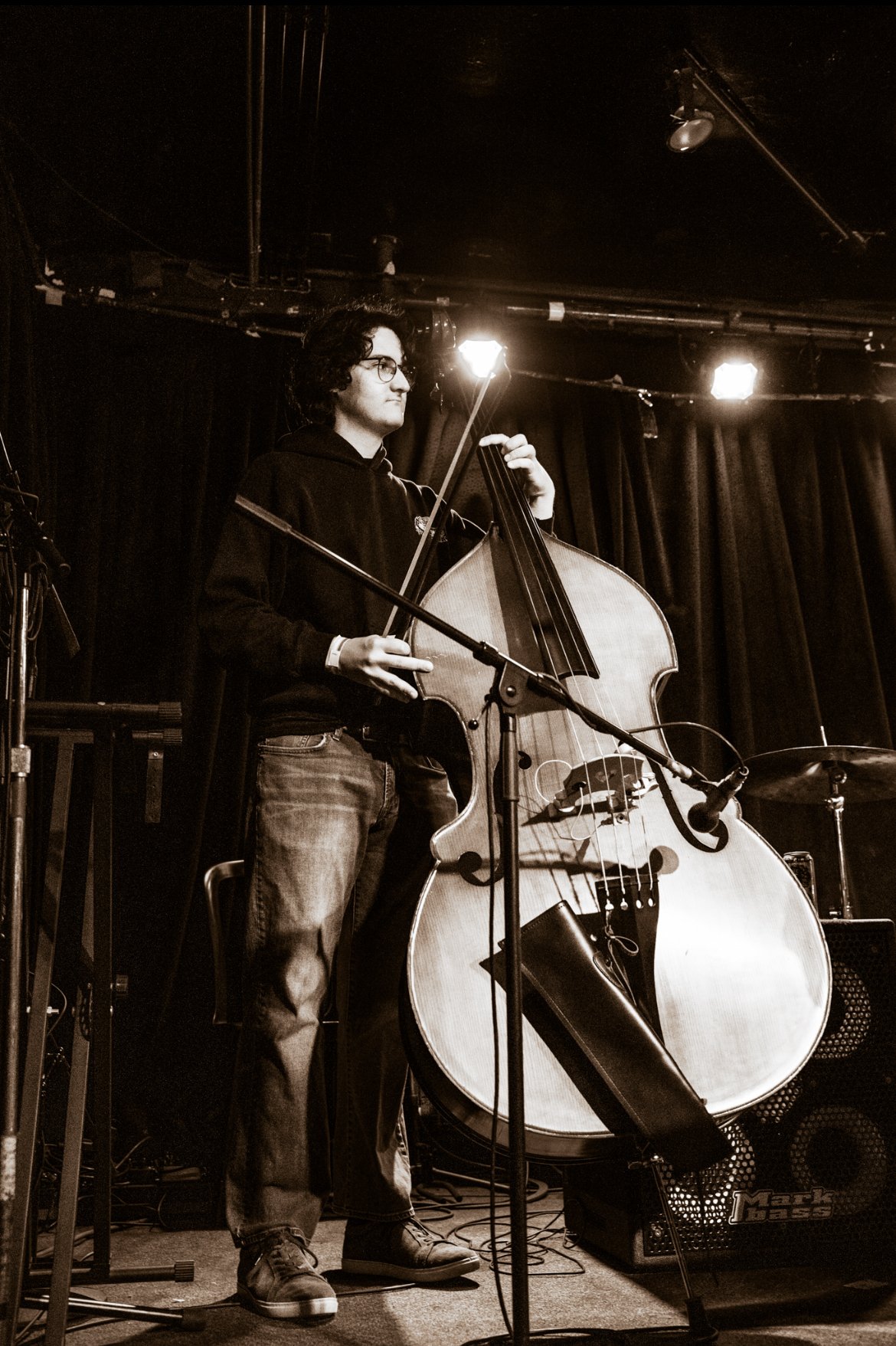 That's Ethan Davila, Julian's bass player and frequent collaborator. 