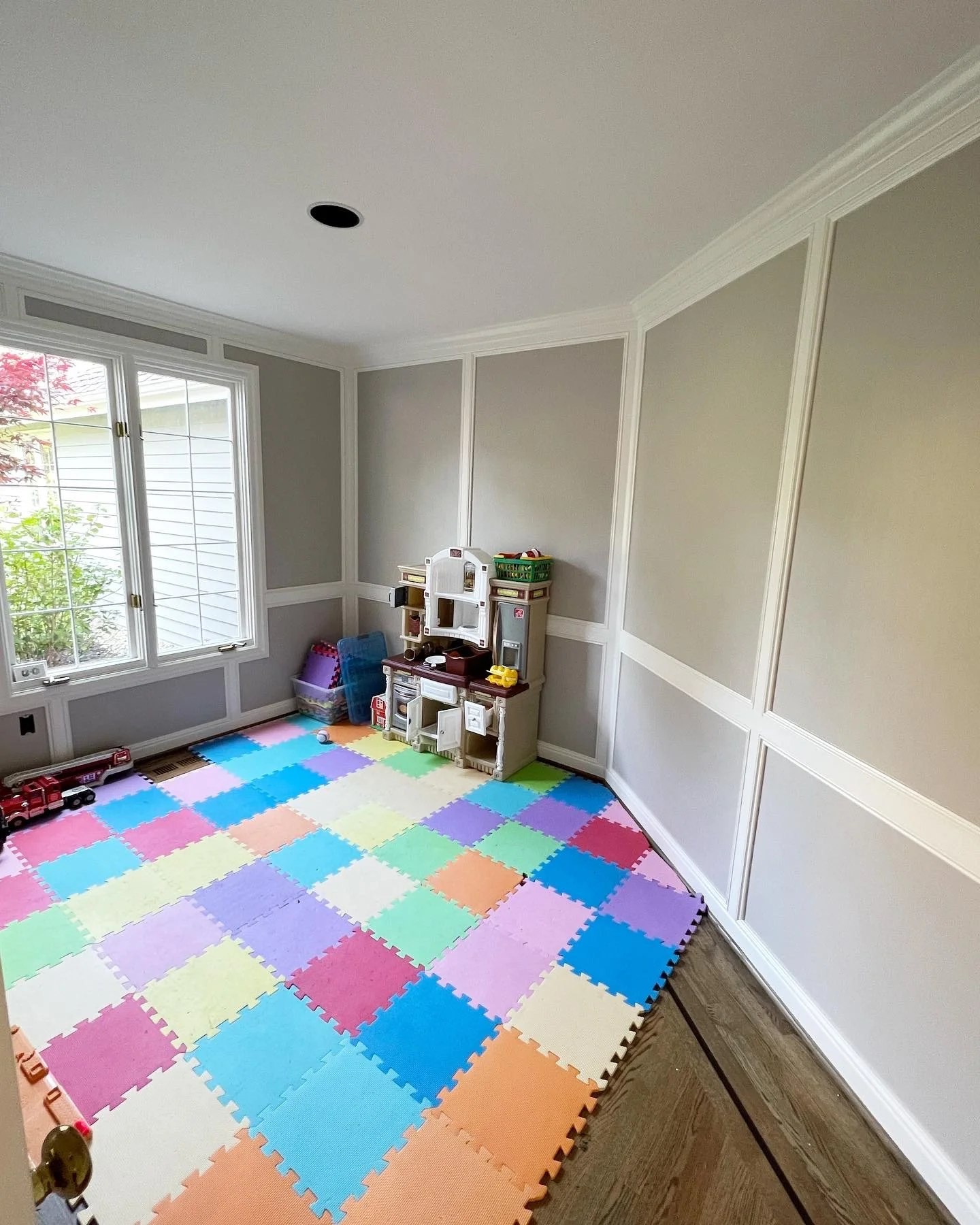 Wood paneling freshly painted.