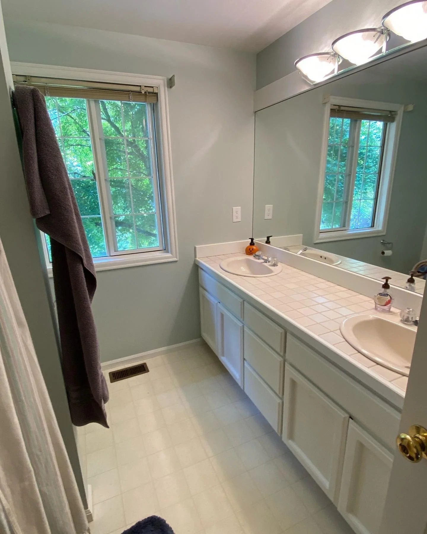 Woods-colored cabinets freshly painted