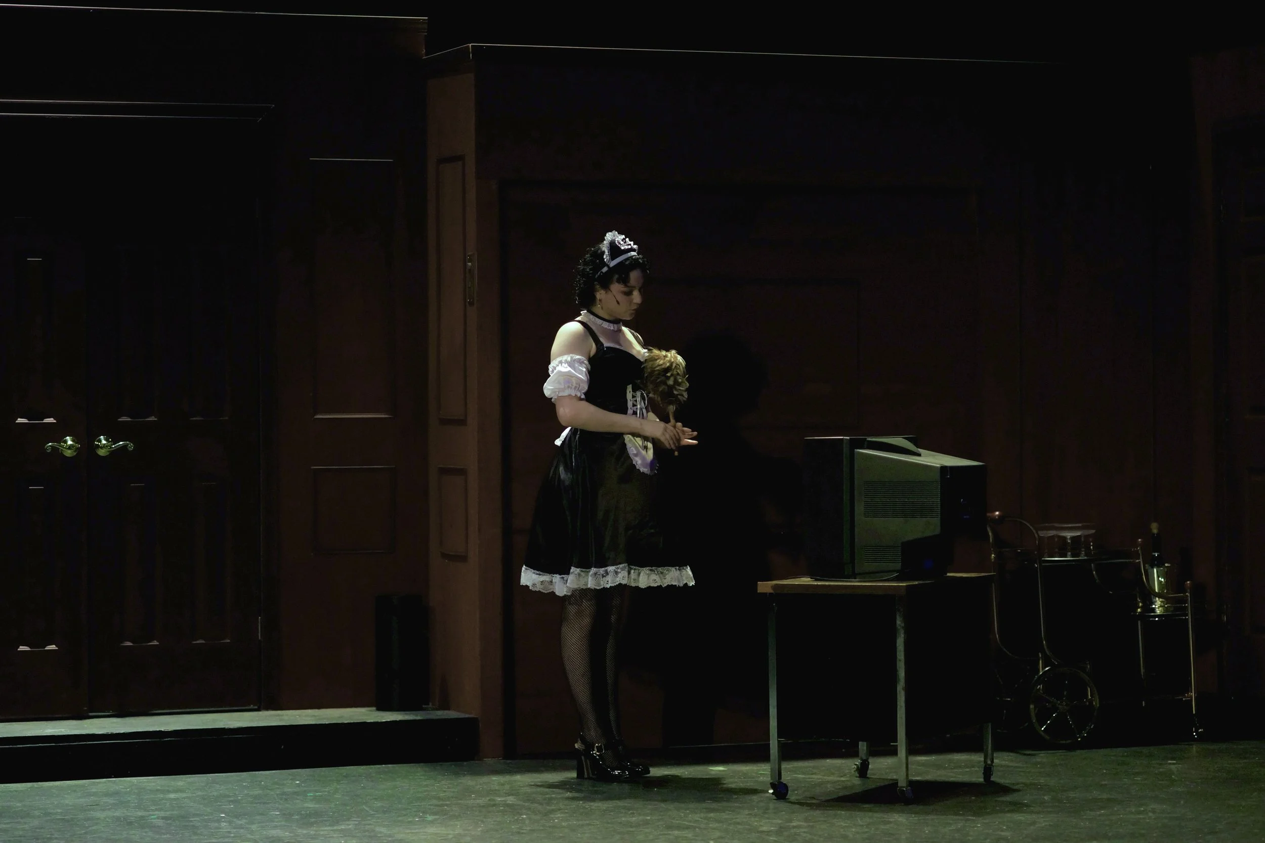 Makena Mitchell as Yvette in Woodstock Playhouse's "CLUE: On Stage"