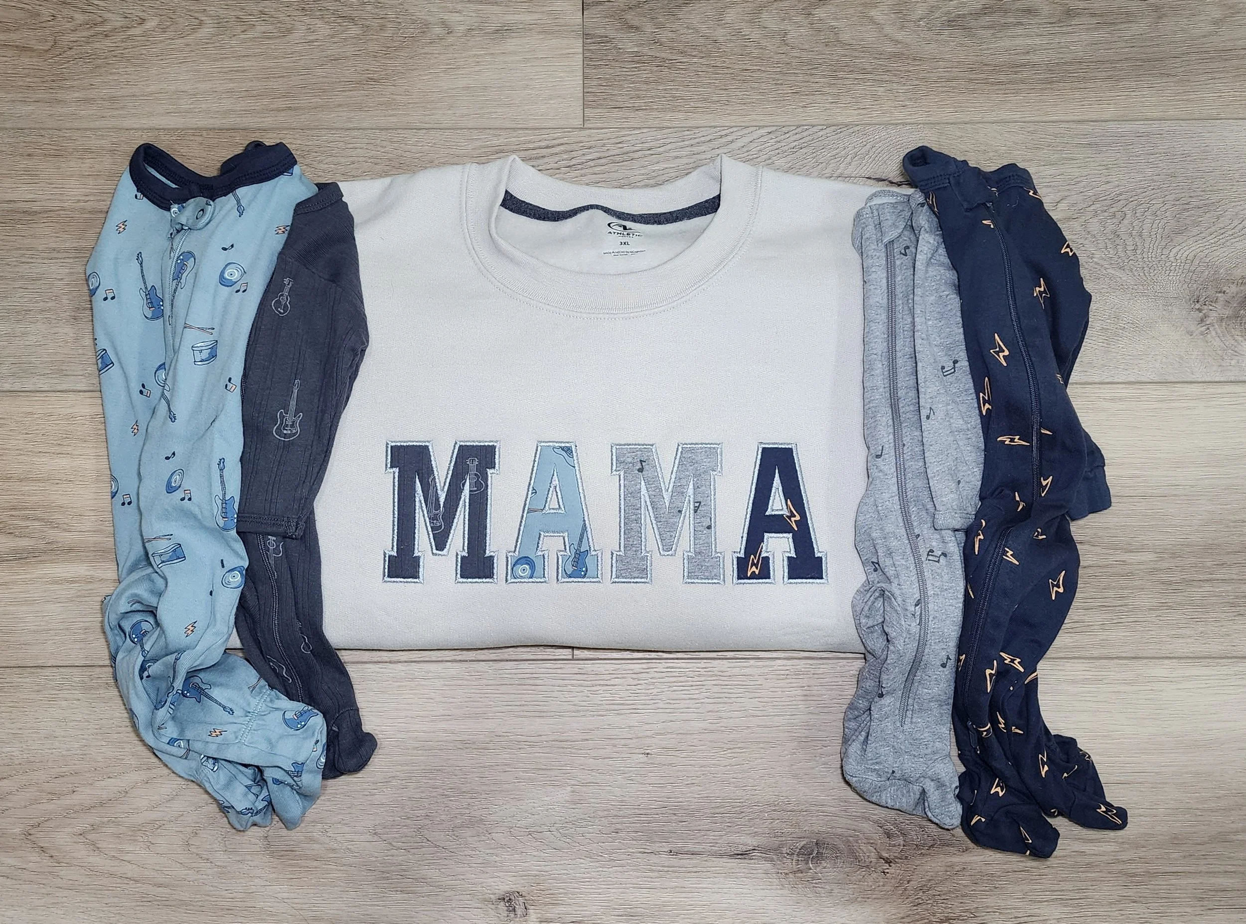 mama applique sweatshirt and babywear next to it. the applique is made out of the babywear