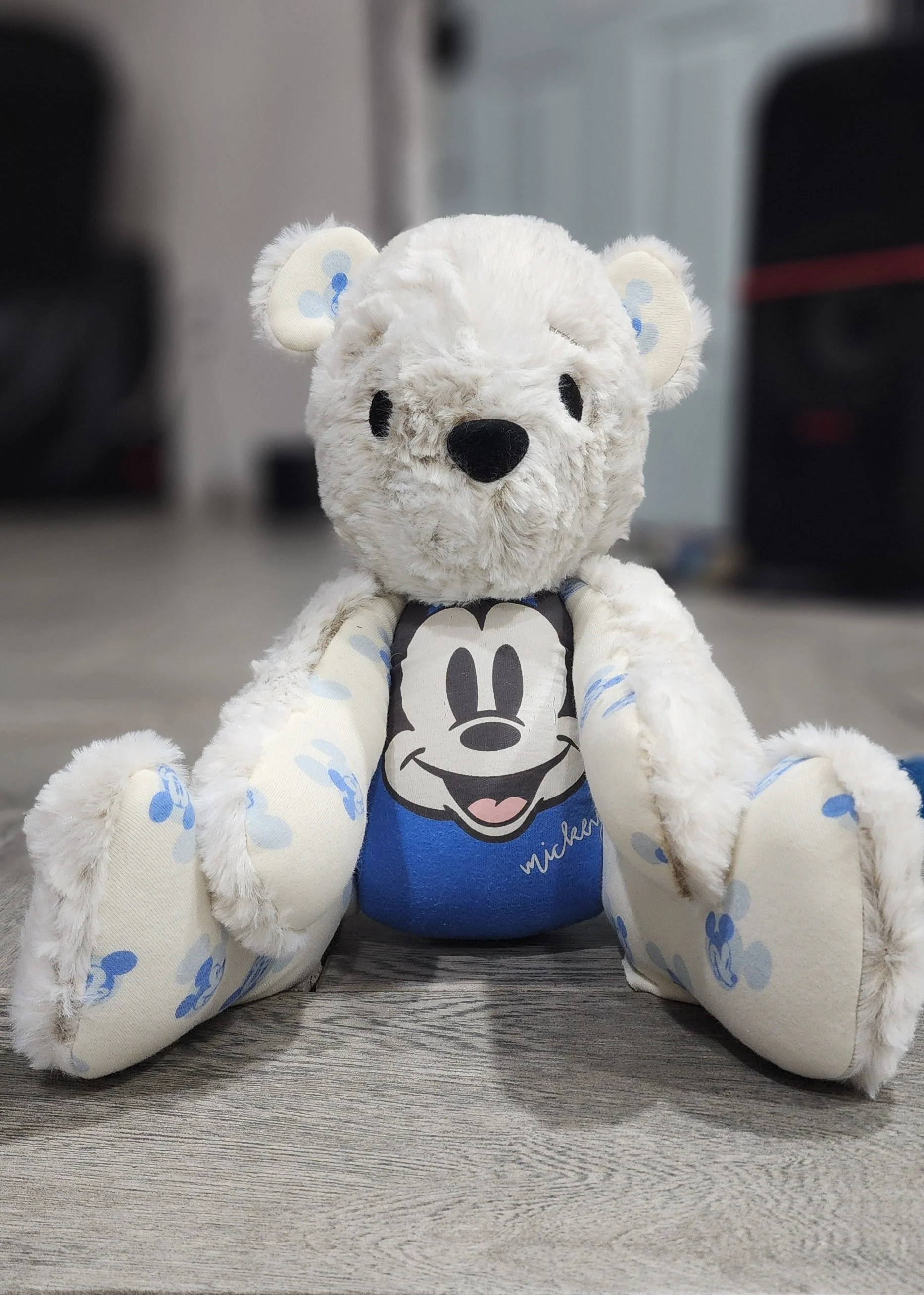 keepsake teddy bear made out of plush fabric and babywear provided by customer