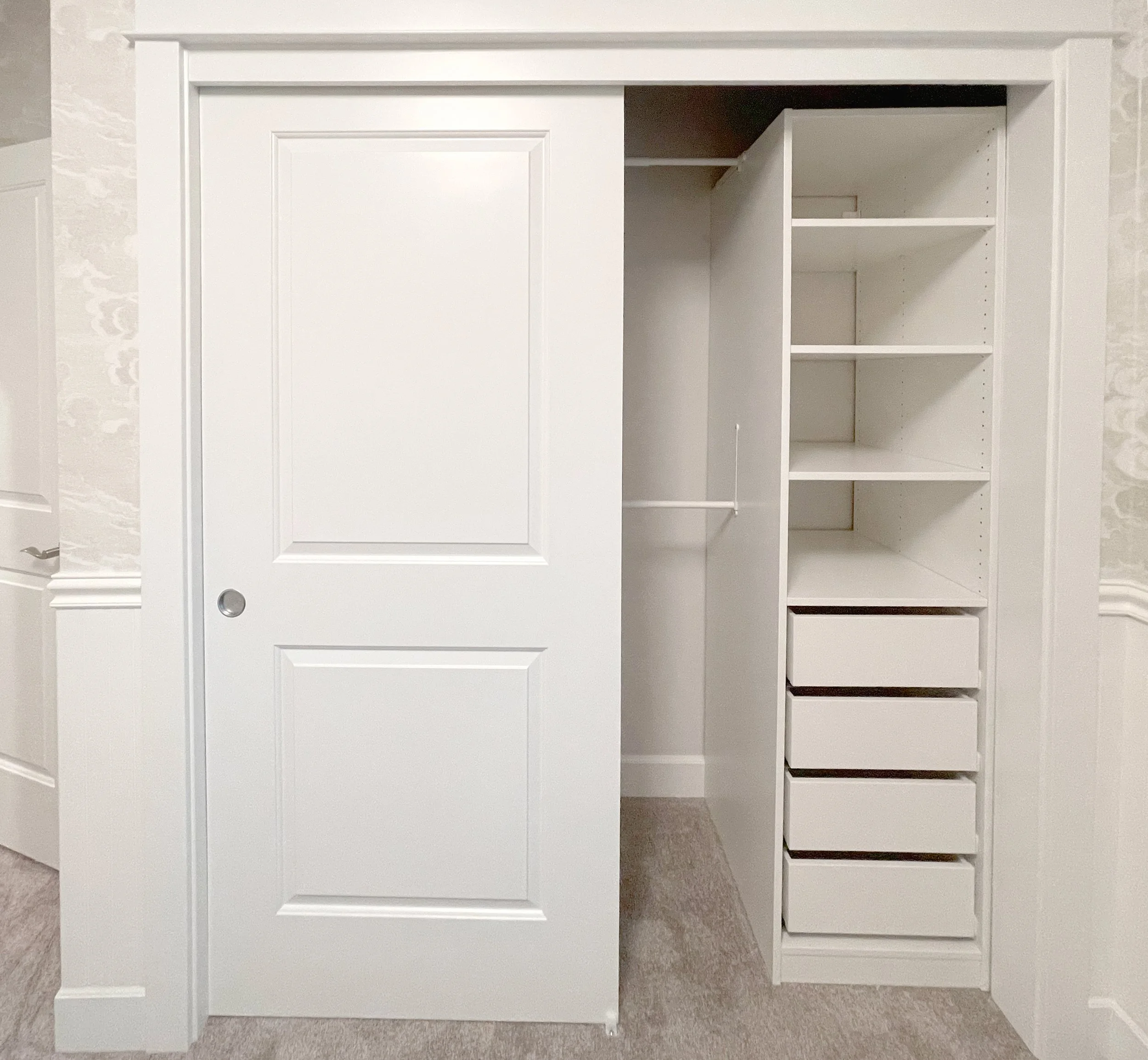 Minimalist Reach-In Closet System with Modern Sliding Doors and Adjustable Shelving - Sai Remodeling LLC Redmond