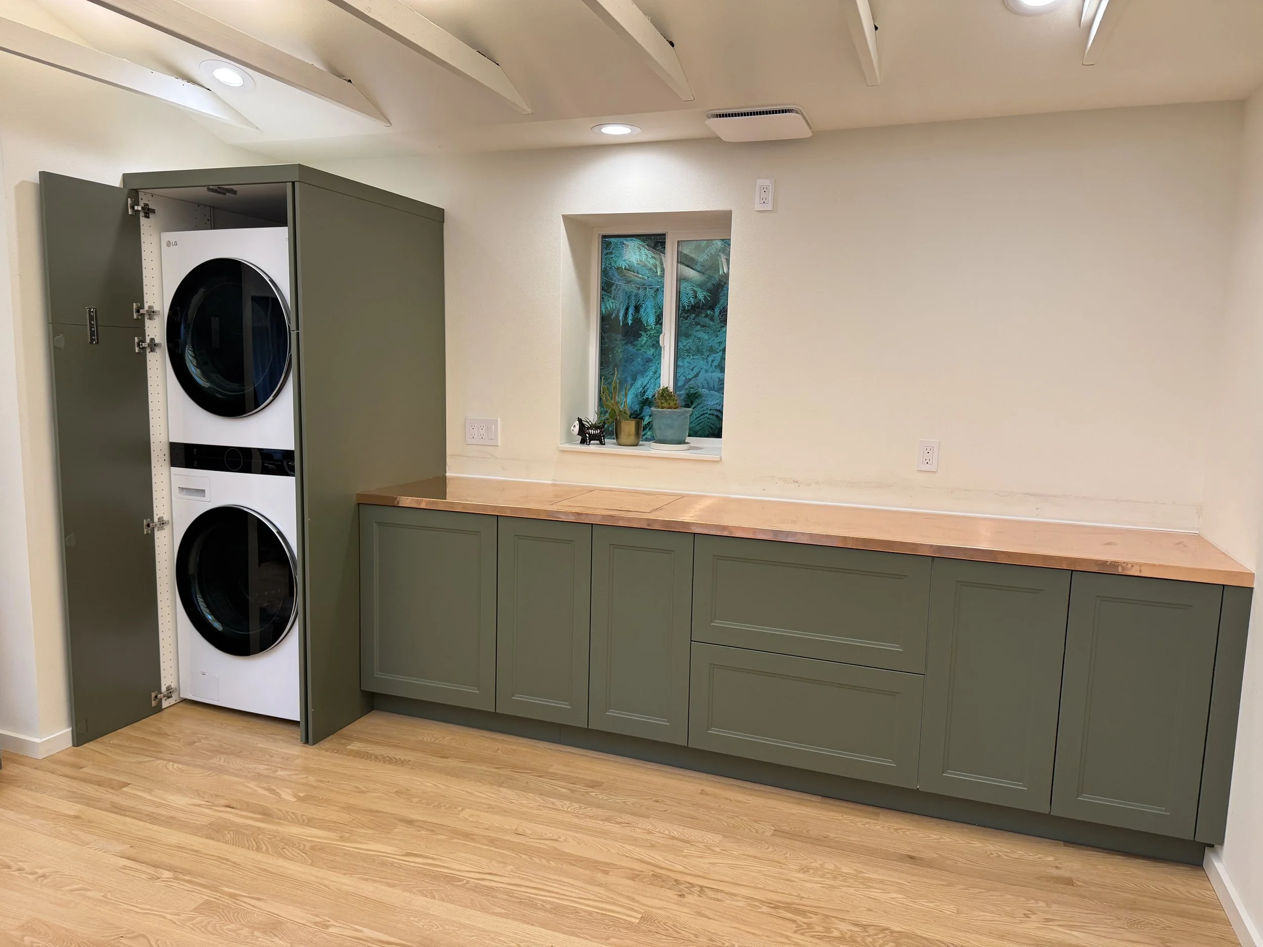 Modern Laundry Room Makeover with Green Custom Cabinets and Hidden Appliance Storage - Sai Remodeling LLC Eastside, Issaquah 
