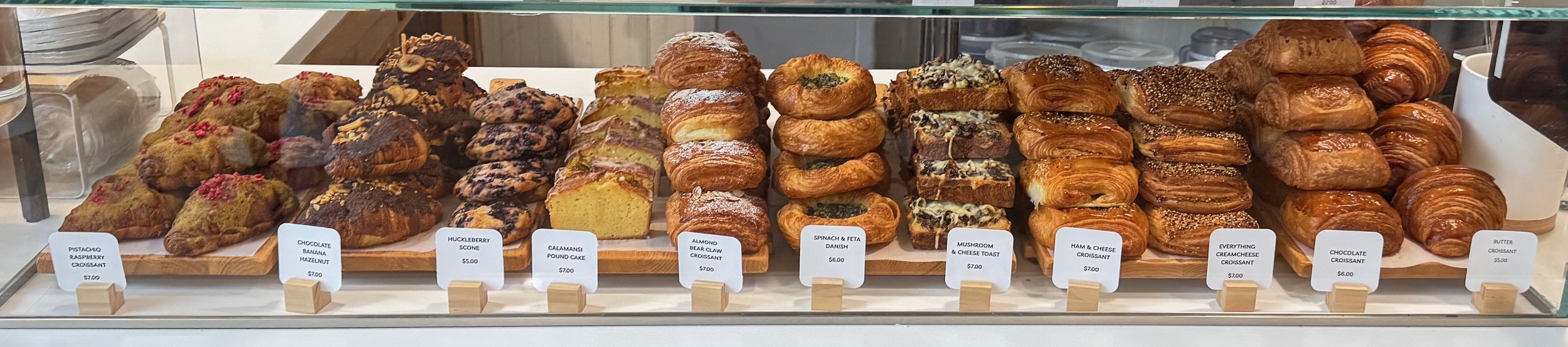 Baka pastries in the display case at Covour Coffee
