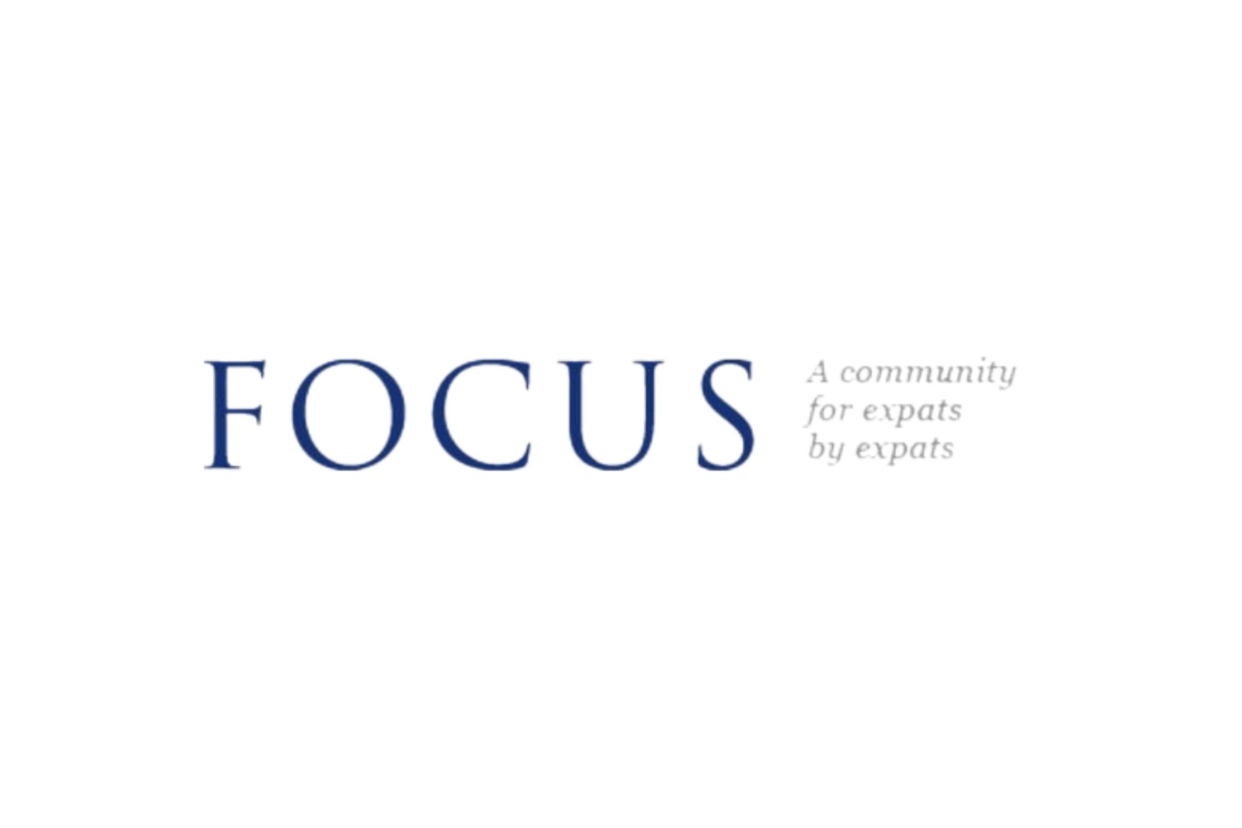 Logo of FOCUS, featuring the word "FOCUS" in large blue letters, with the tagline "A community for expats by expats" in smaller gray font to the right.