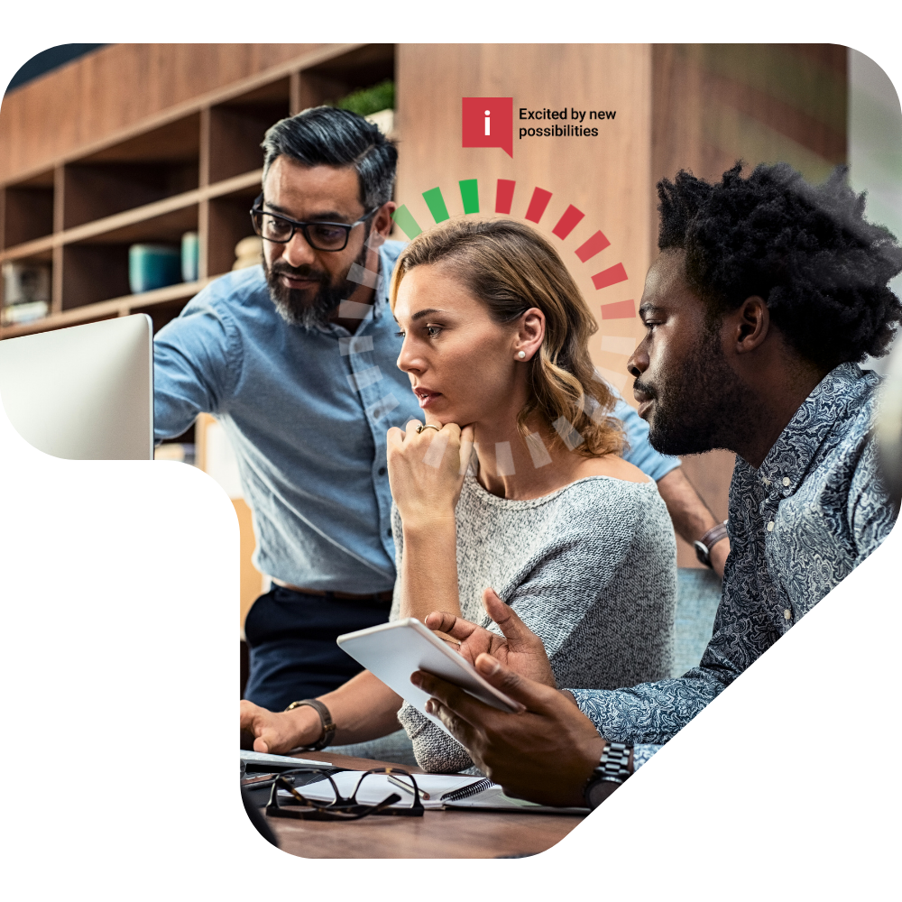 Three colleagues work together on a project in an office, looking at a computer screen, with one person holding a tablet. The woman appears focused, while the men are discussing and pointing at the screen. A graphic element features a red exclamation mark and the text 'Excited by new possibilities.'