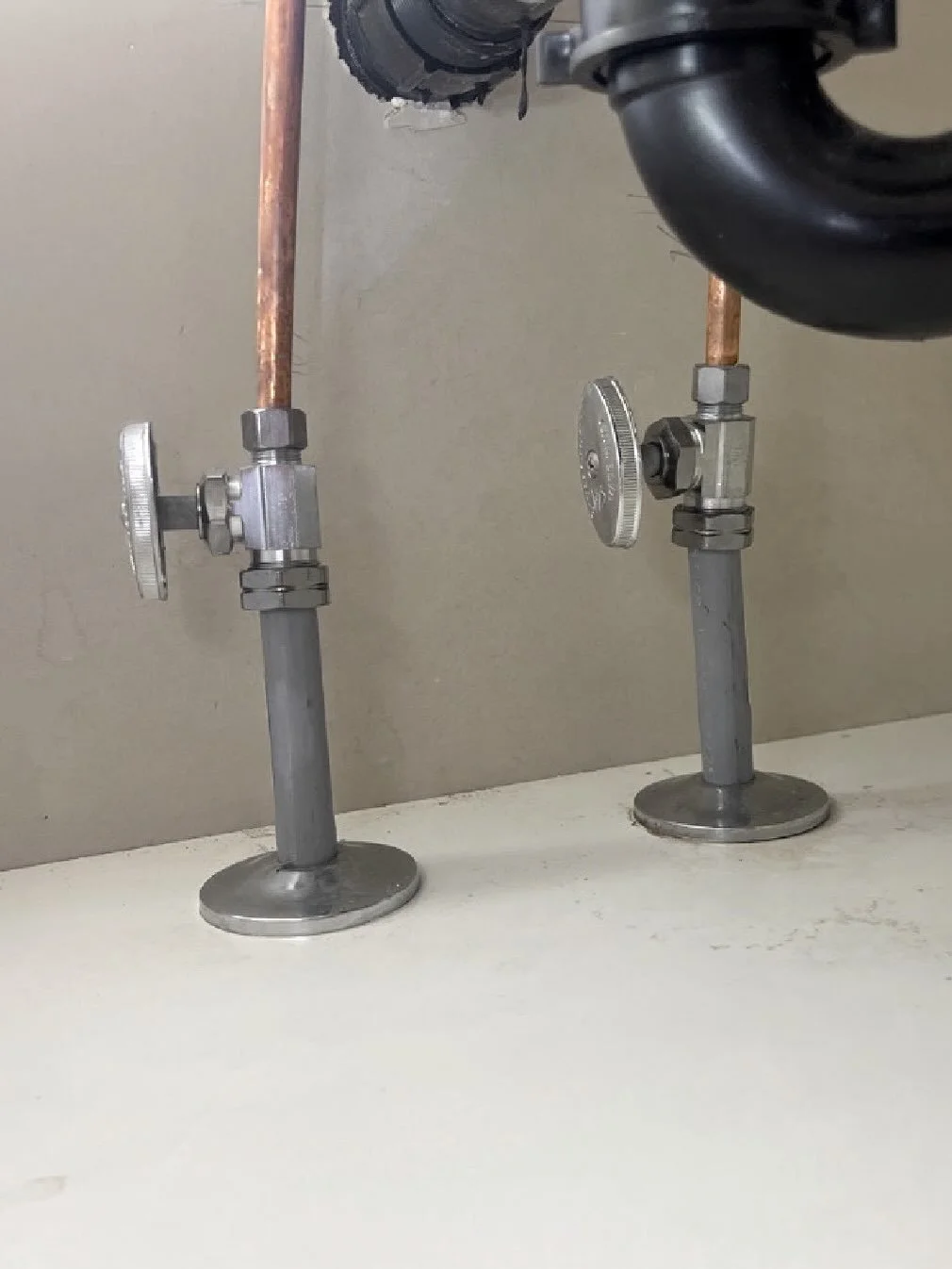 During a recent home inspection, our inspector immediately recognized the grey piping beneath the sink as polybutylene. After a more thorough evaluation, that initial observation was confirmed with additional exposed piping found throughout the basem