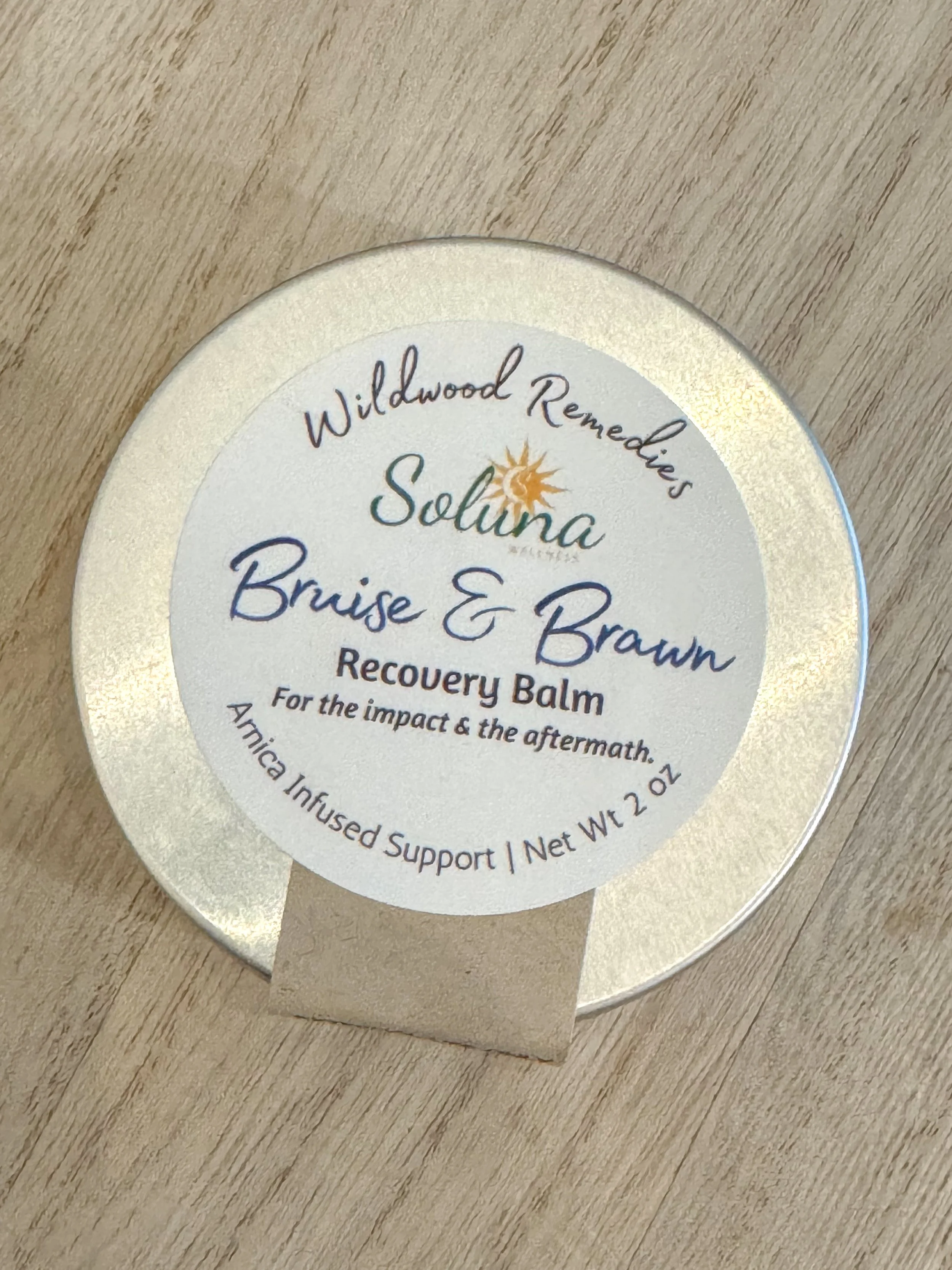 Bruise and Brawn 2oz arnica salve for muscle recovery and bruise relief.