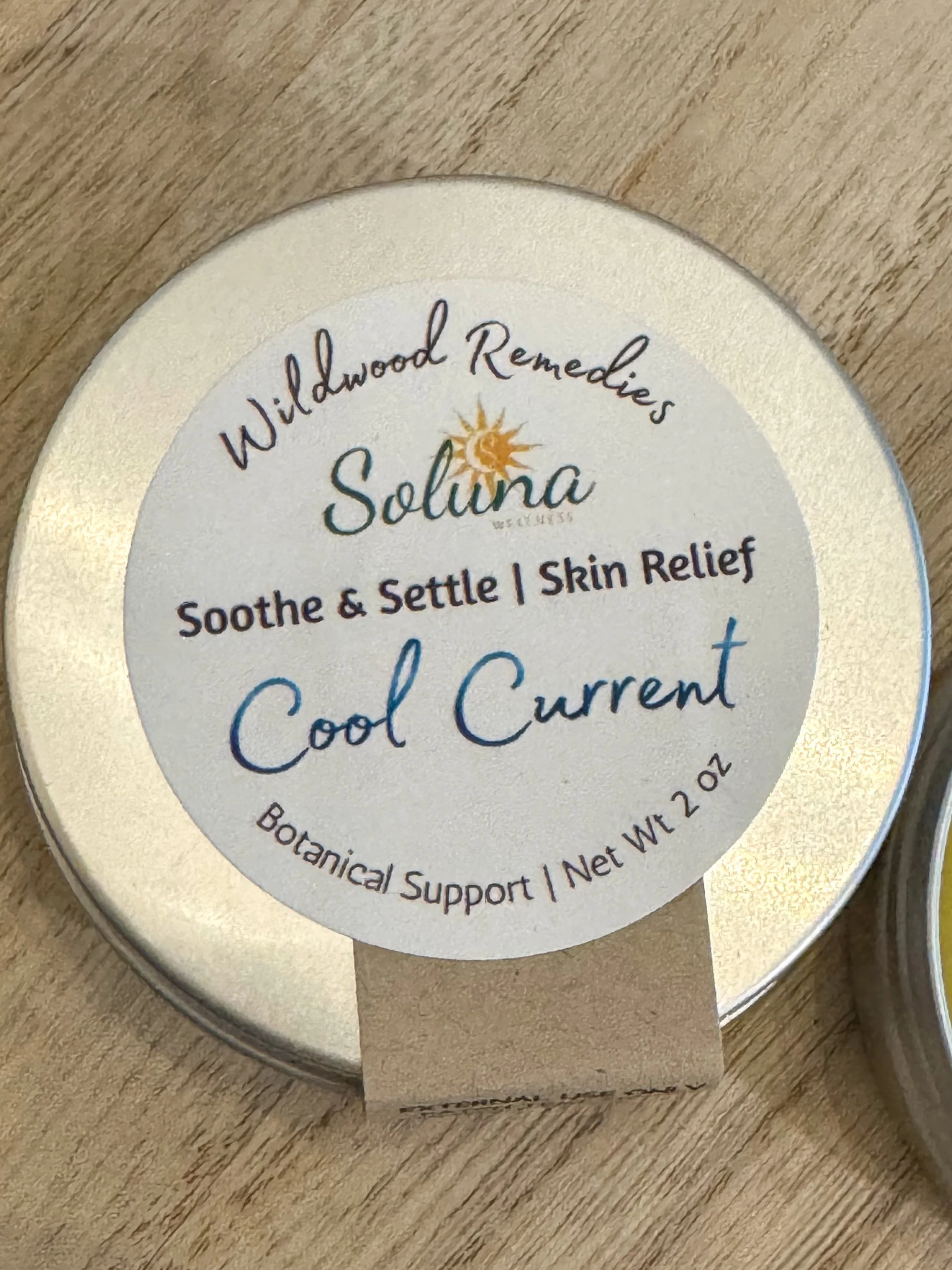 Cool Current Wildwood Soothe and Settle 2oz tin for hormonal itch and inflammation relief.