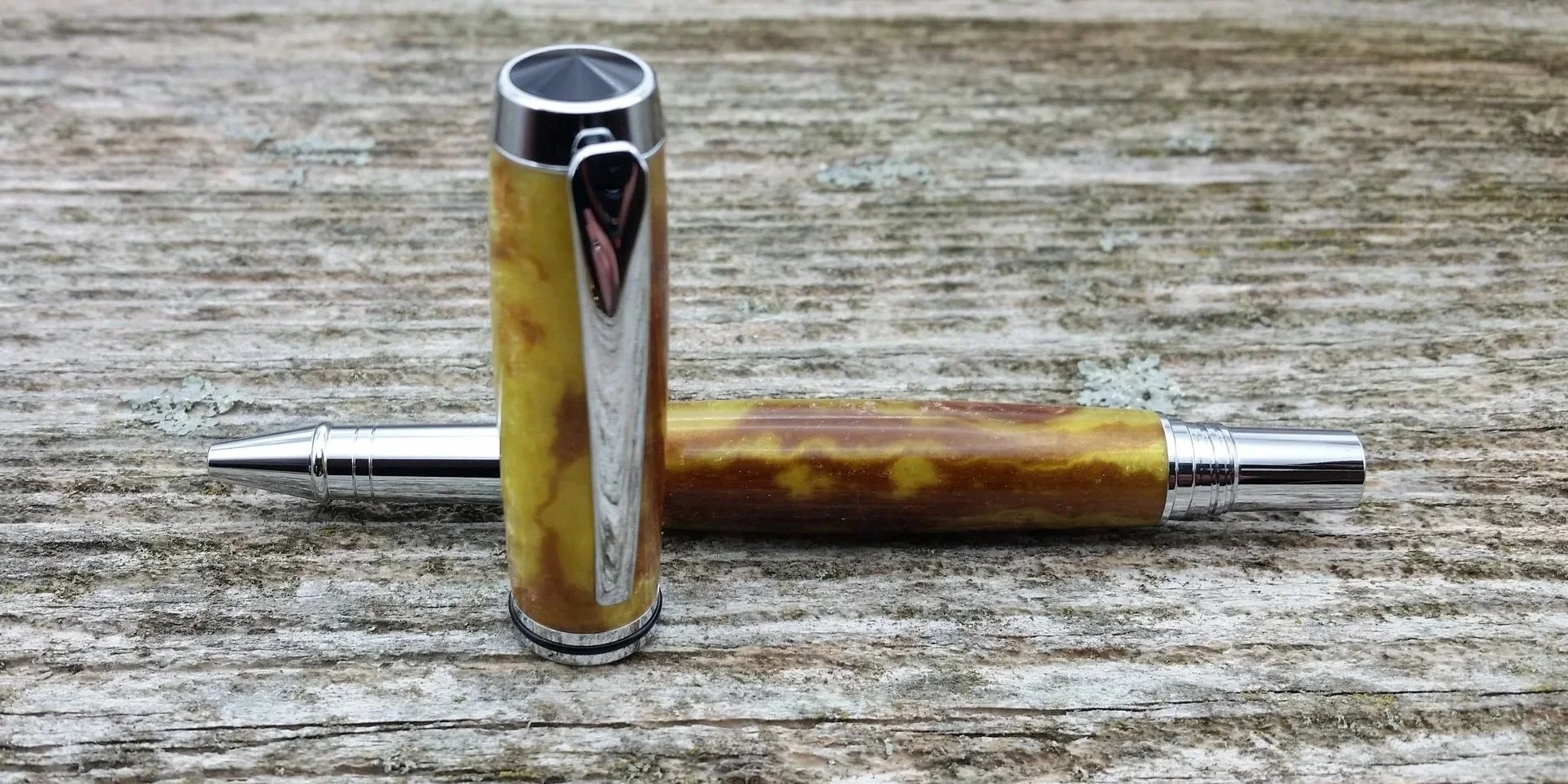 Parus Pen rollerball pen with yellow and brown resin and chrome hardware cap view