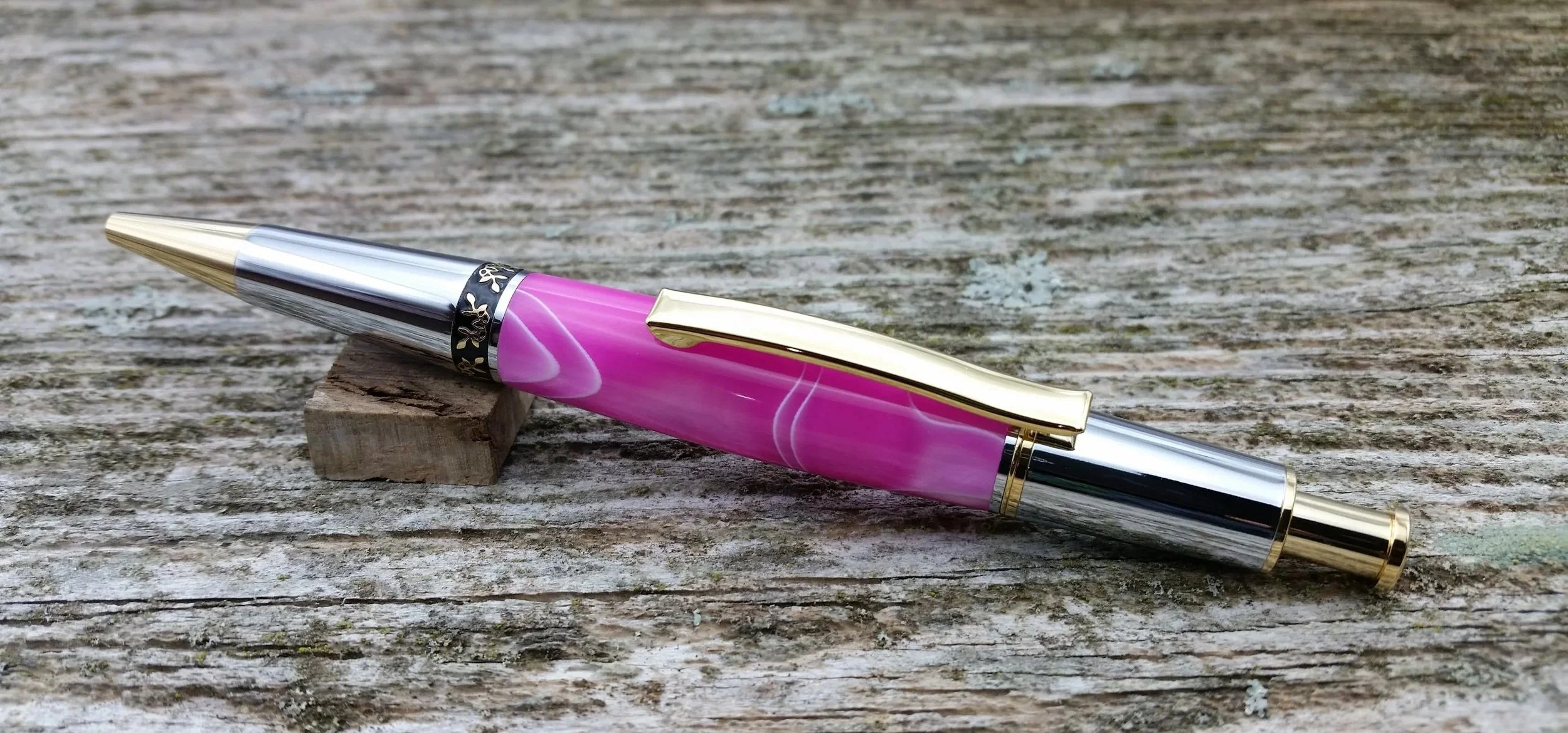 Parus Pen ballpoint click pen with 10K gold, chrome, and pearlescent pink resin clip view