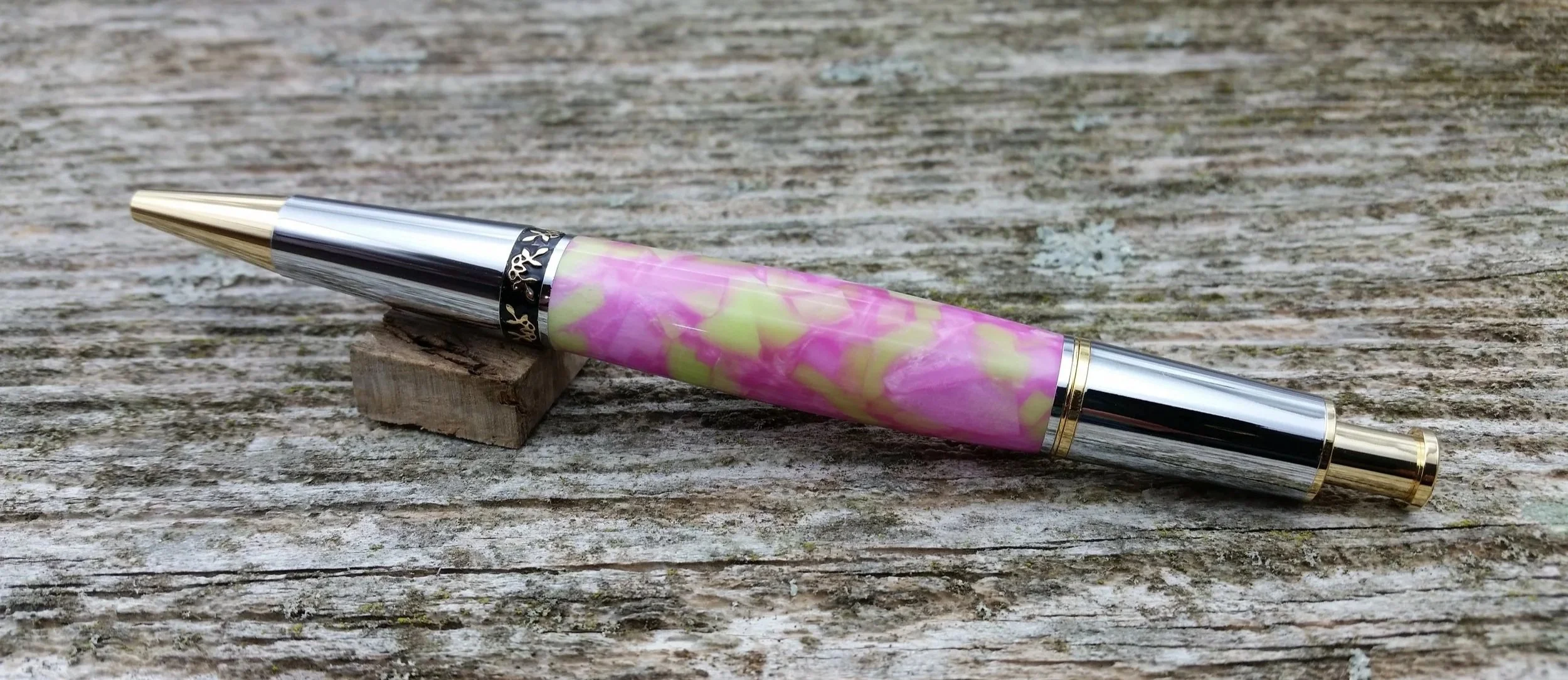 Parus Pen ballpoint click pen with 10K gold, chrome, and pink and green resin rear view