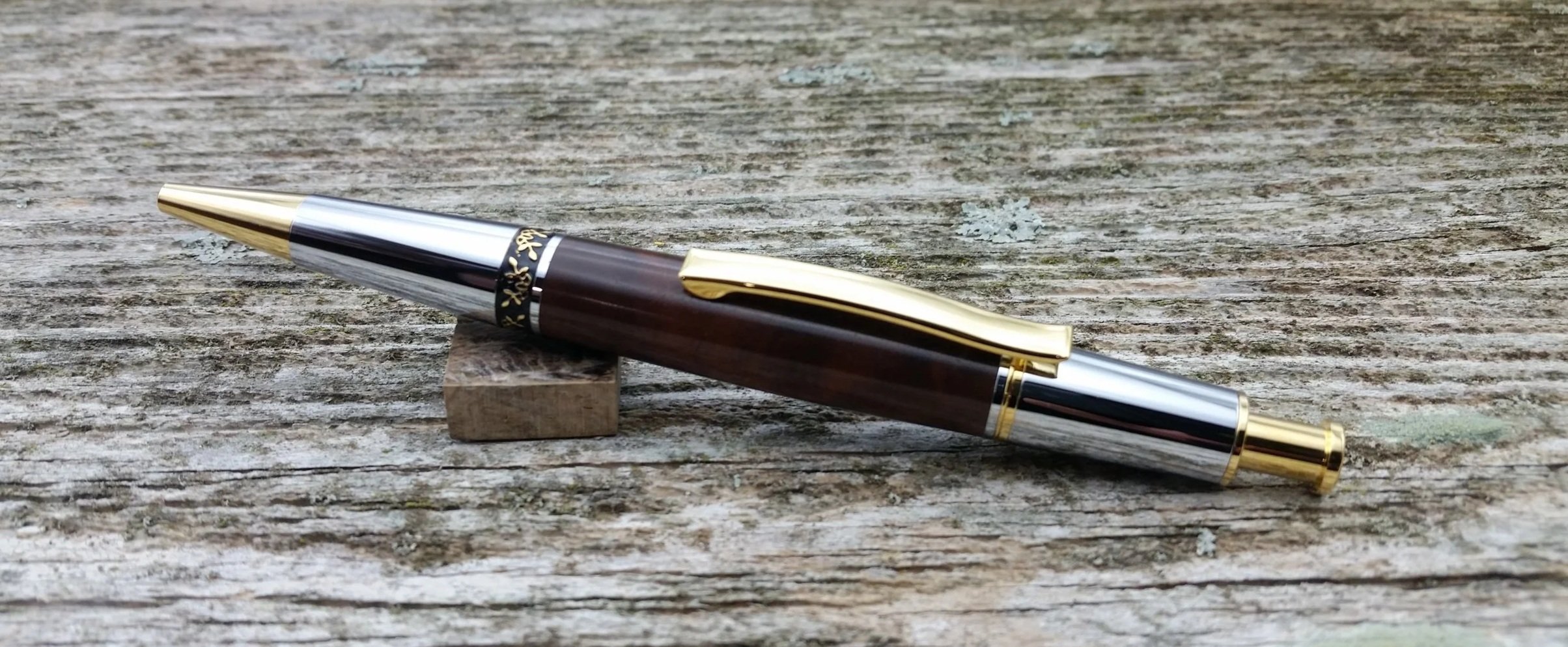 Parus Pen ballpoint click pen with 10K gold and chrome hardware and redwood clip view