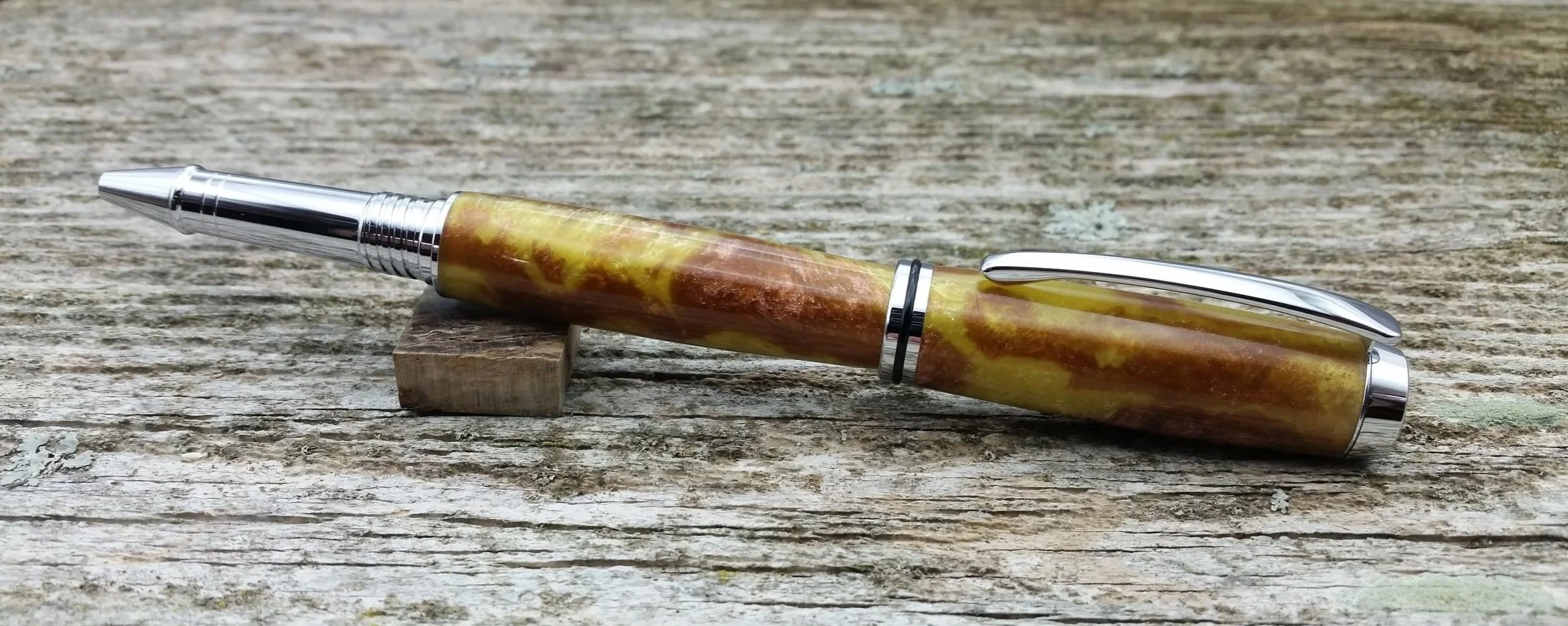 Parus Pen rollerball pen with yellow and brown resin and chrome hardware posted view