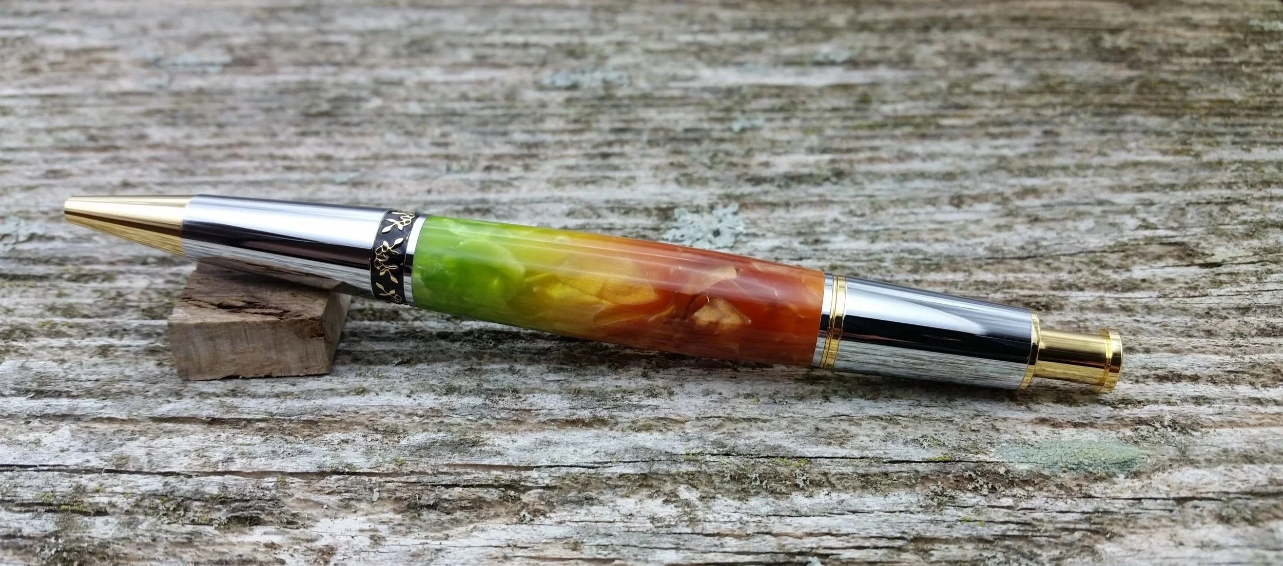 Parus Pen ballpoint click pen with 10K gold and brown and green resin rear view