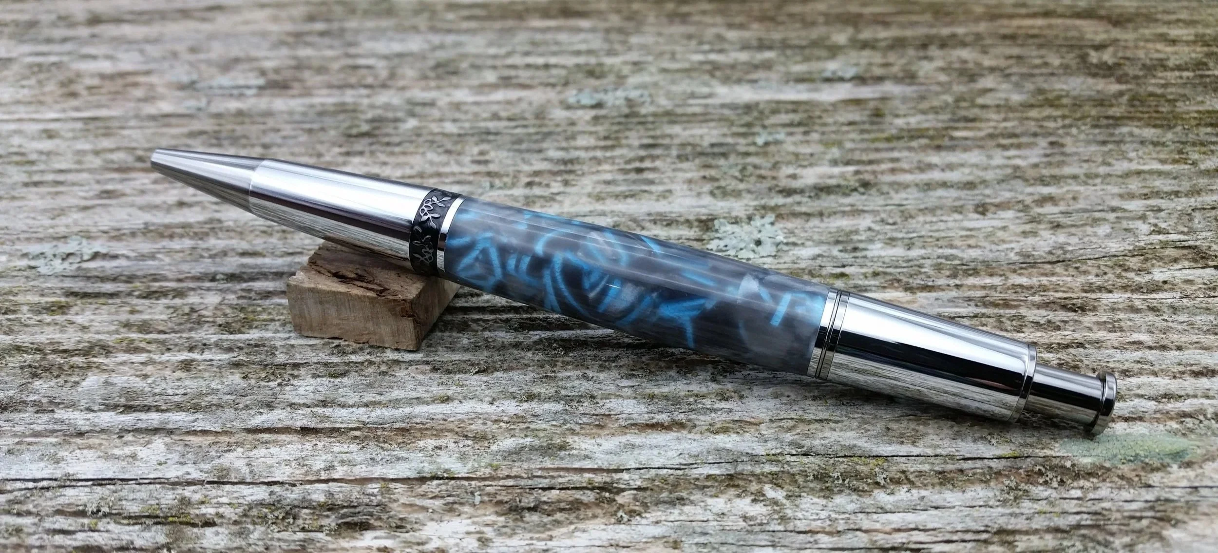 Parus Pen ballpoint click pen with black titanium and blue and black resin rear view