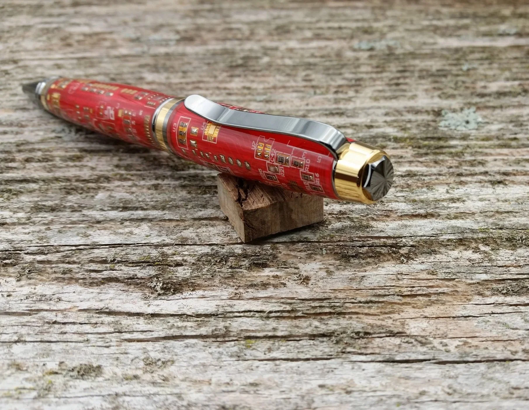 ballpoint twist pen with red circuit boards