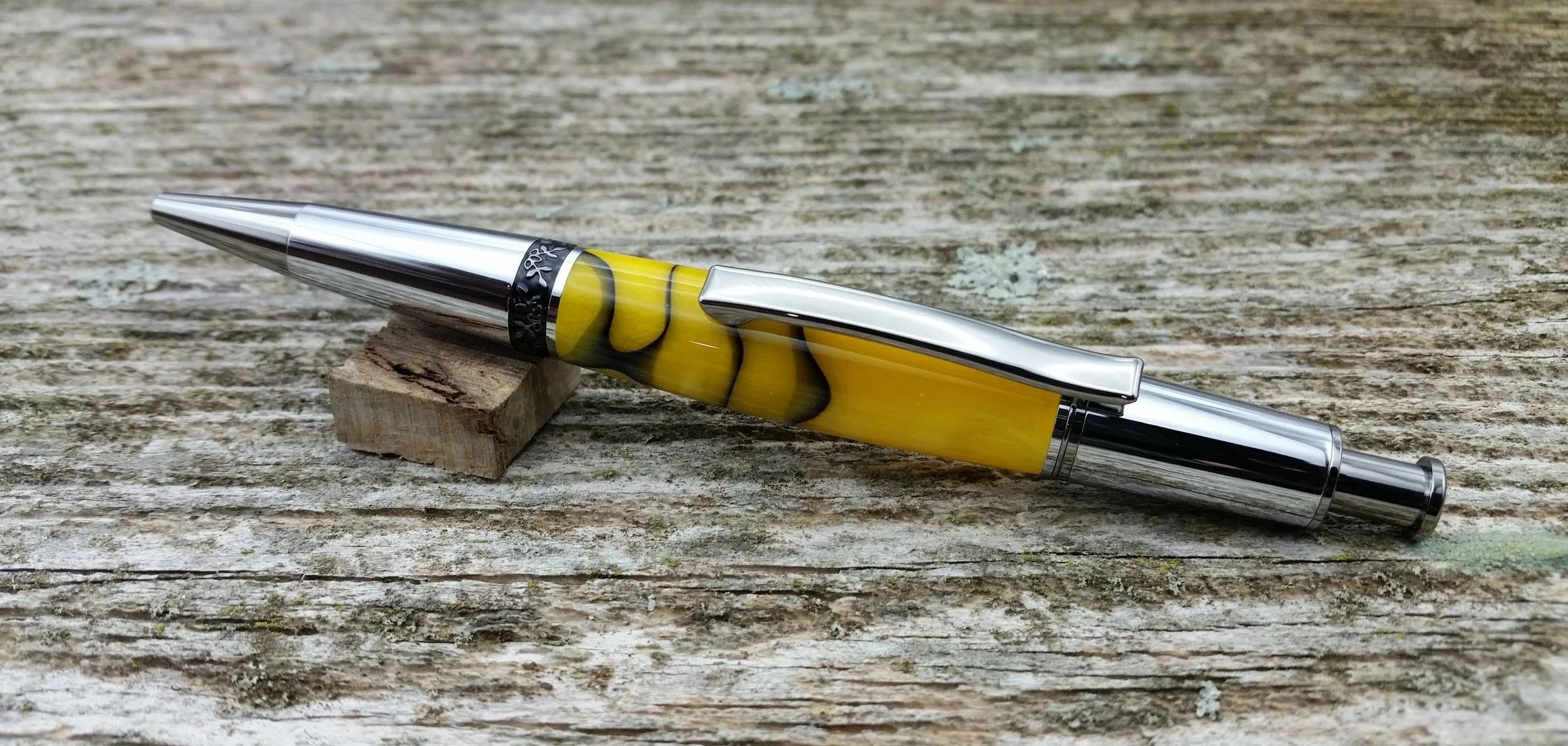 Parus Pen ballpoint click pen with black titanium, chrome, and pearlescent yellow resin clip view.jpg