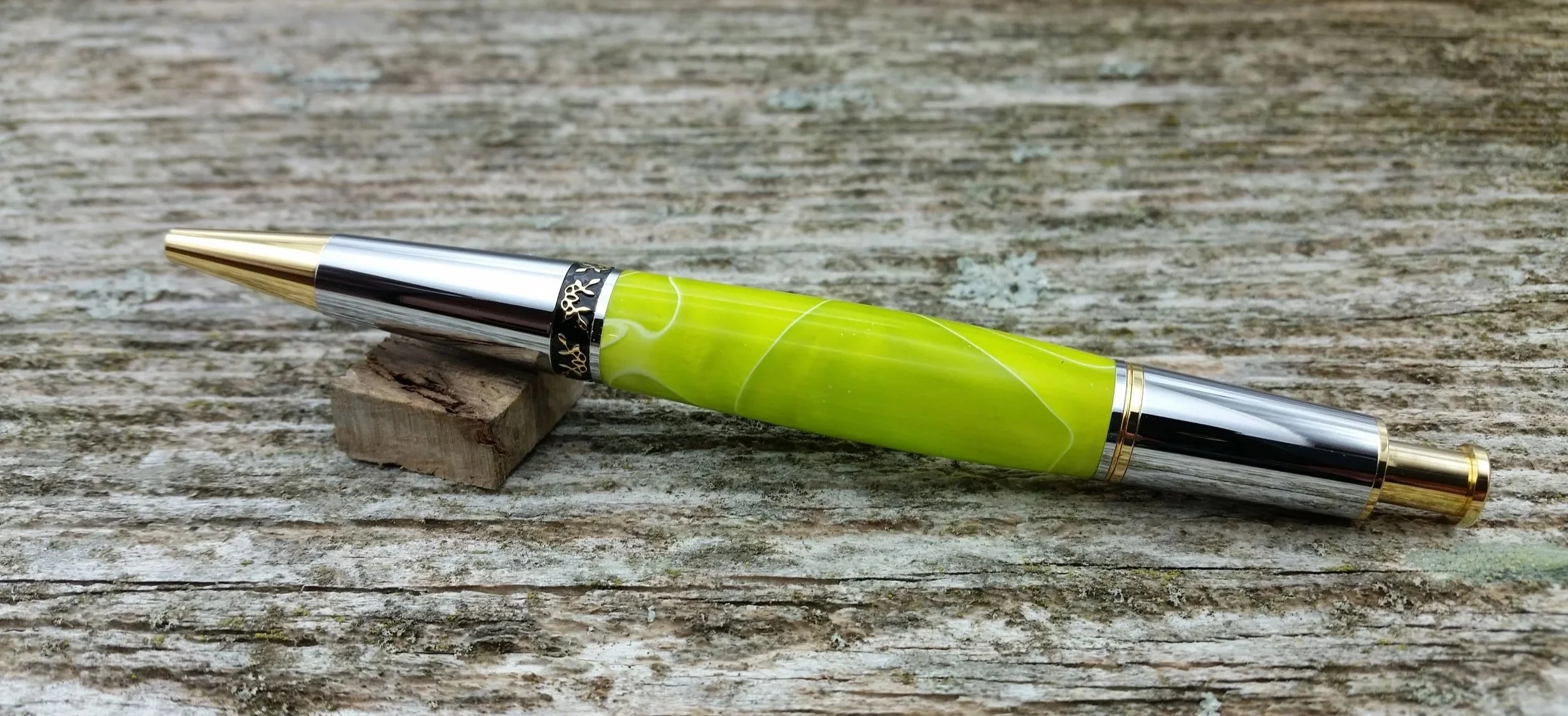 Parus Pen ballpoint click pen with 10K gold, chrome, and pearlescent green resin rear view
