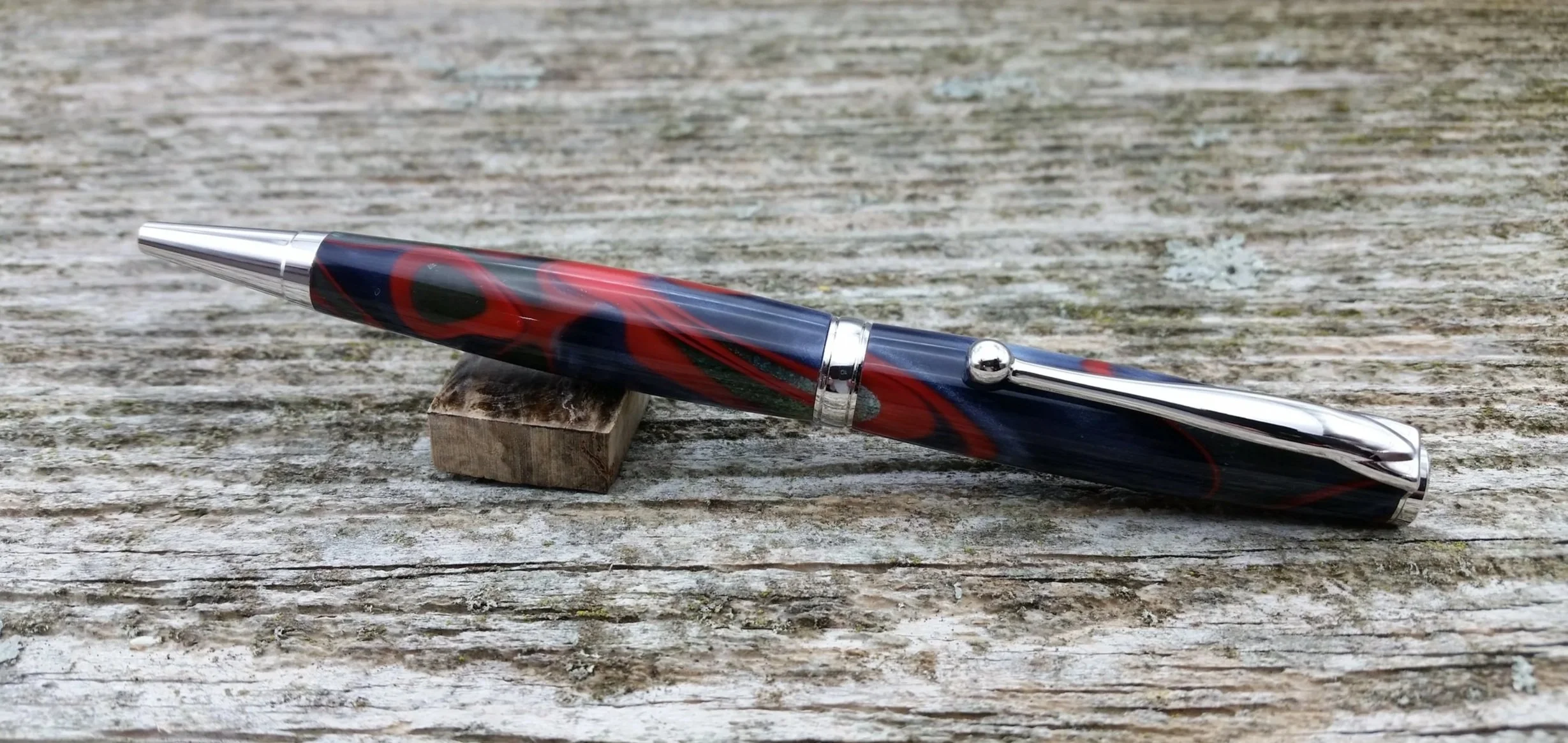 Parus Pen ballpoint twist pen with rhodium hardware and multicolored resin clip view