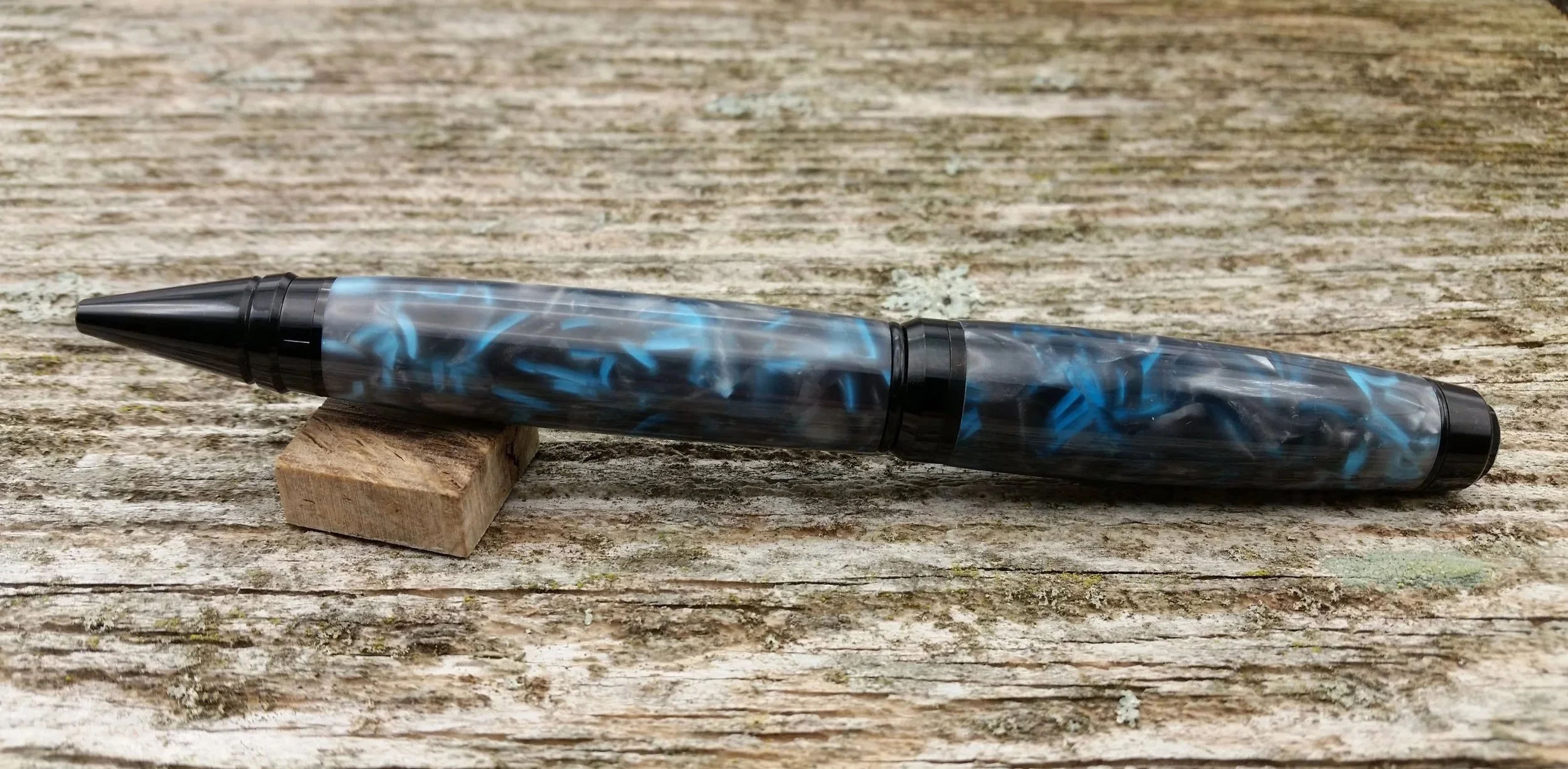 ballpoint twist pen with blue and black resin