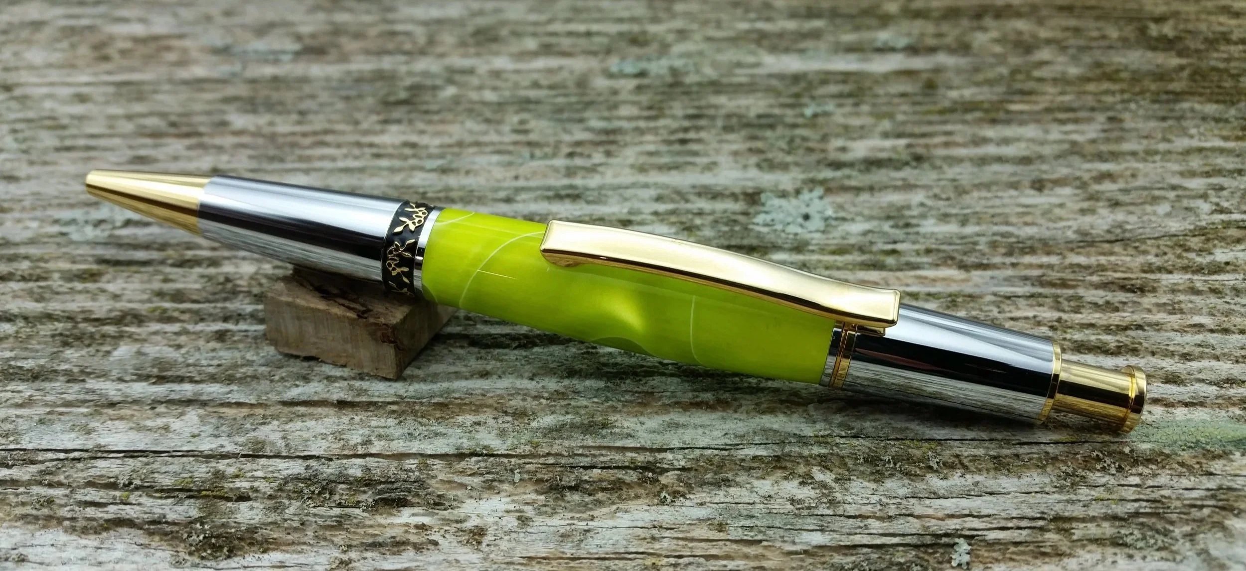 Parus Pen ballpoint click pen with 10K gold, chrome, and pearlescent green resin clip view