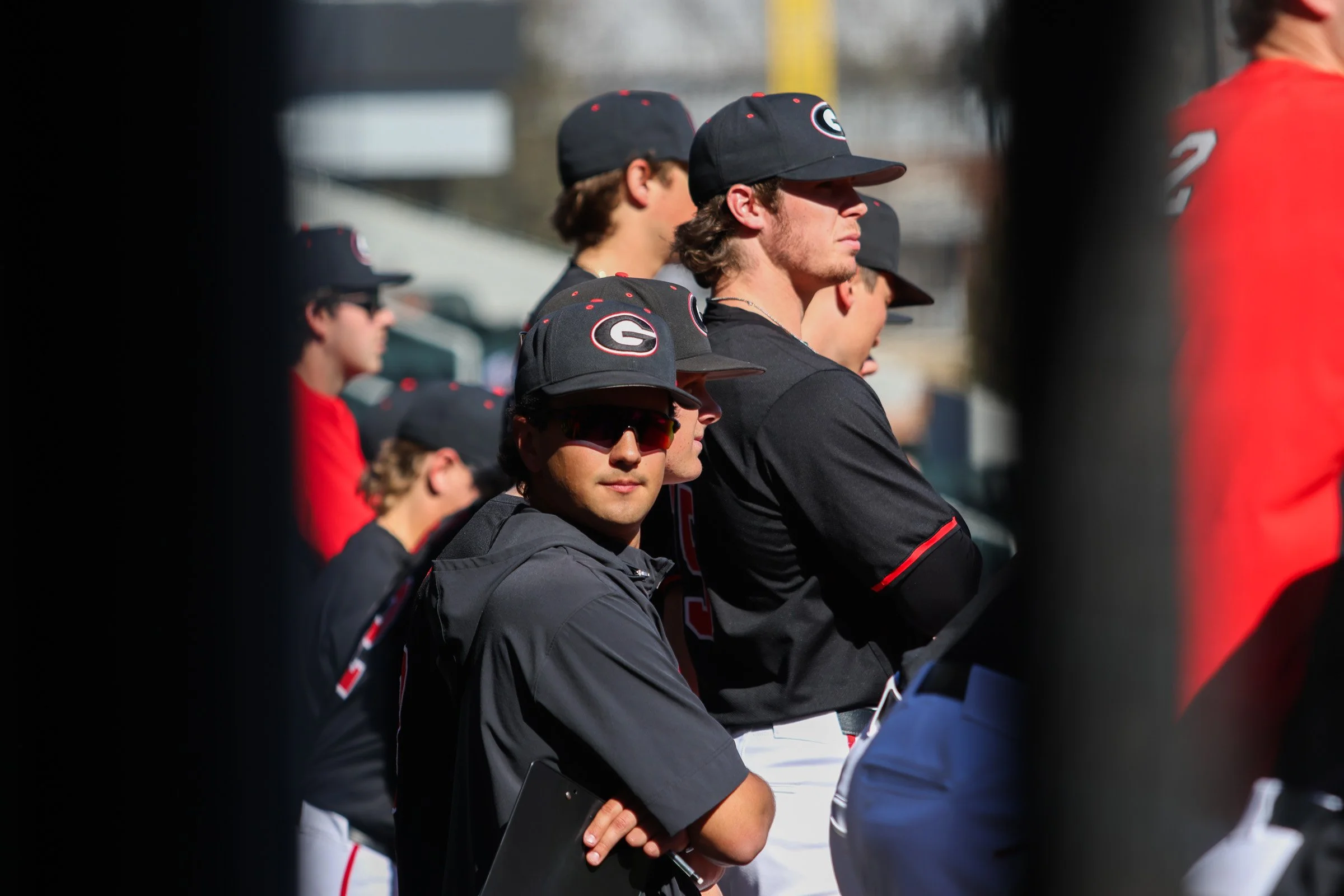 The University of Georgia baseball team watches from the dugout during their game against Florida Golf Coast at Foley Field in Athens, Georgia, on Feb. 28, 2025. The sixth-ranked Georgia Bulldogs beat Florida Golf Coast in 10-9 walk-off win for their