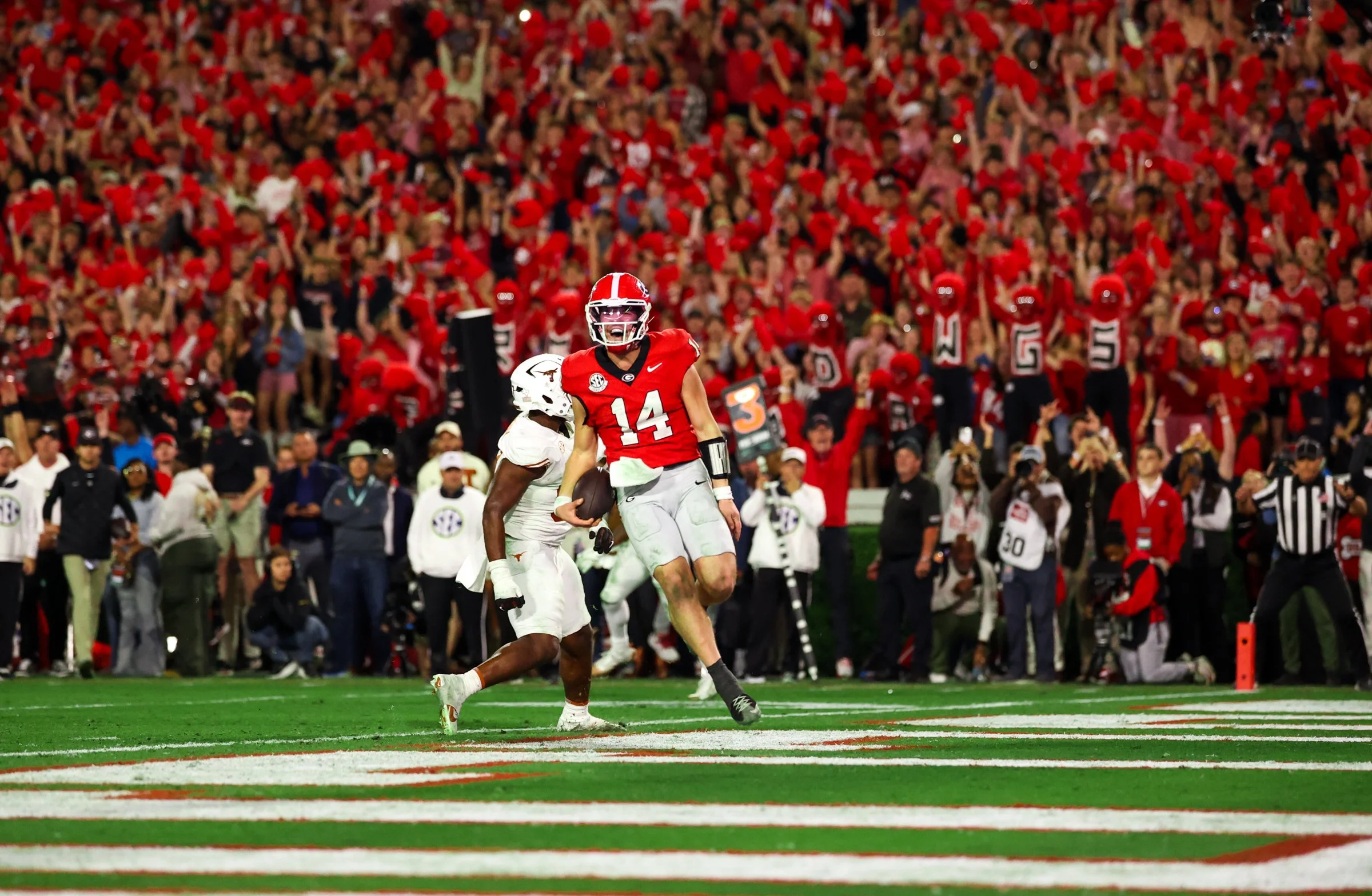 Georgia quarterback Gunner Stockton (14) celebrates after scoring a touchdown during the second half of the football game between Georgia and Texas at Sanford Stadium in Athens, Georgia, on Saturday, Nov. 15, 2025. Georgia won 35-10. (Photo/Kaleb Tat