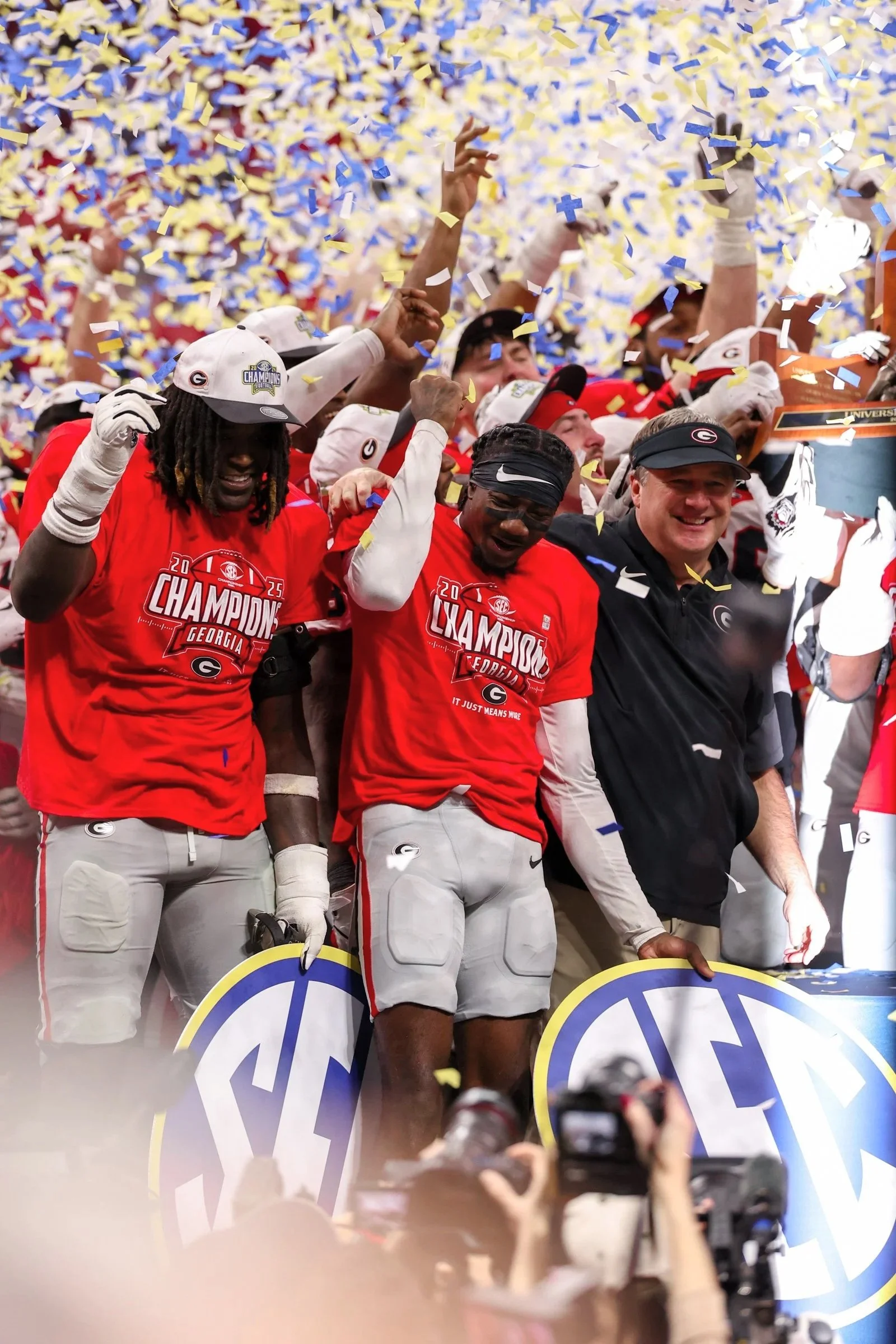 Georgia head coach Kirby Smart celebrates with his team after Georgia wins the SEC Championship game between Georgia and Alabama at Mercedes-Benz Stadium in Atlanta, Georgia, on Saturday, Dec. 6, 2025. Georgia won 28-7. (Photo/Kaleb Tatum)
