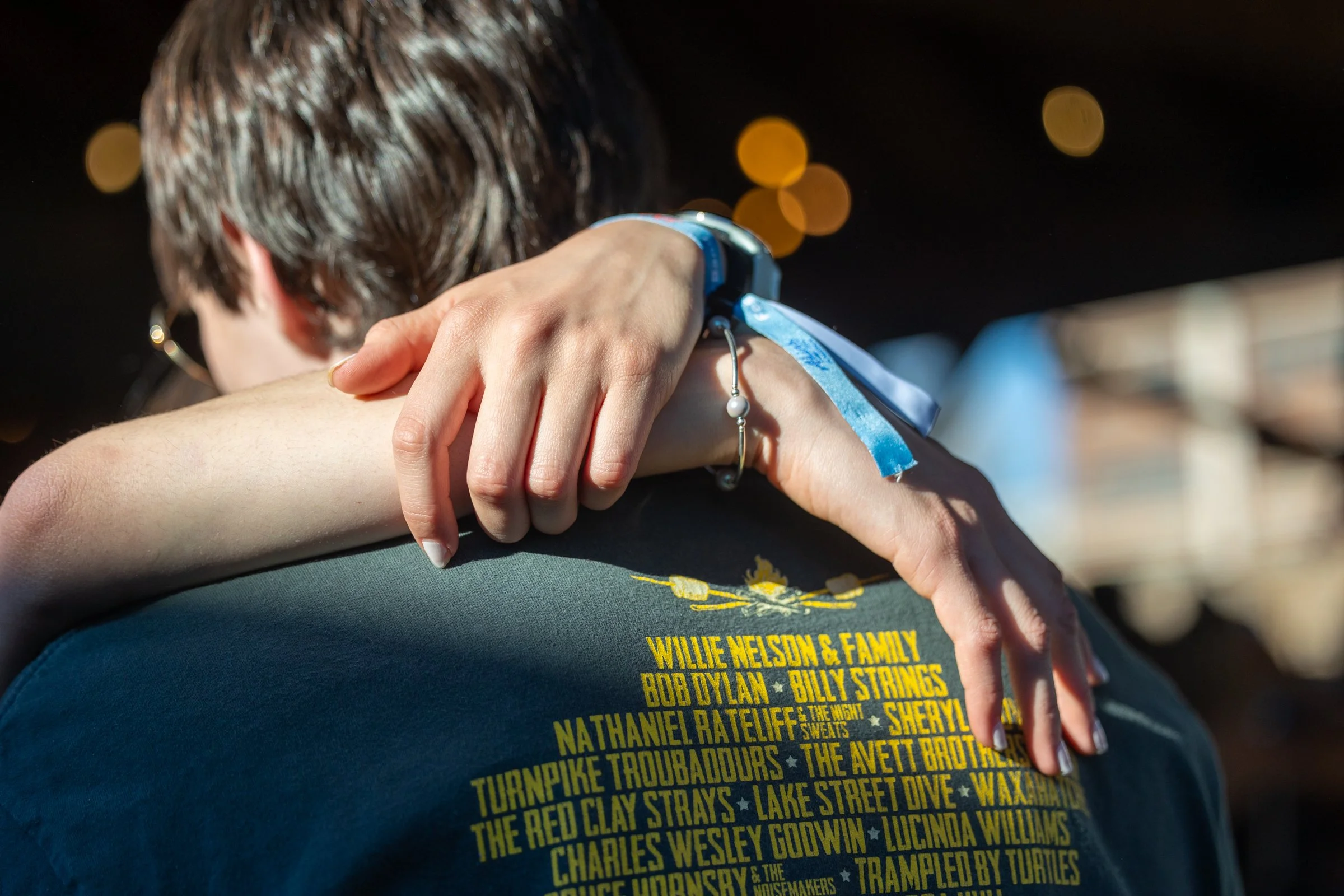 Attendees dance with each other during the Jam in the Streets for Jam for Cam in downtown Athens, Georgia, on Saturday, March 28, 2026. Jam for Cam honors Cameron Fearon, a University of Georgia student, who passed away from metastatic melanoma in Au