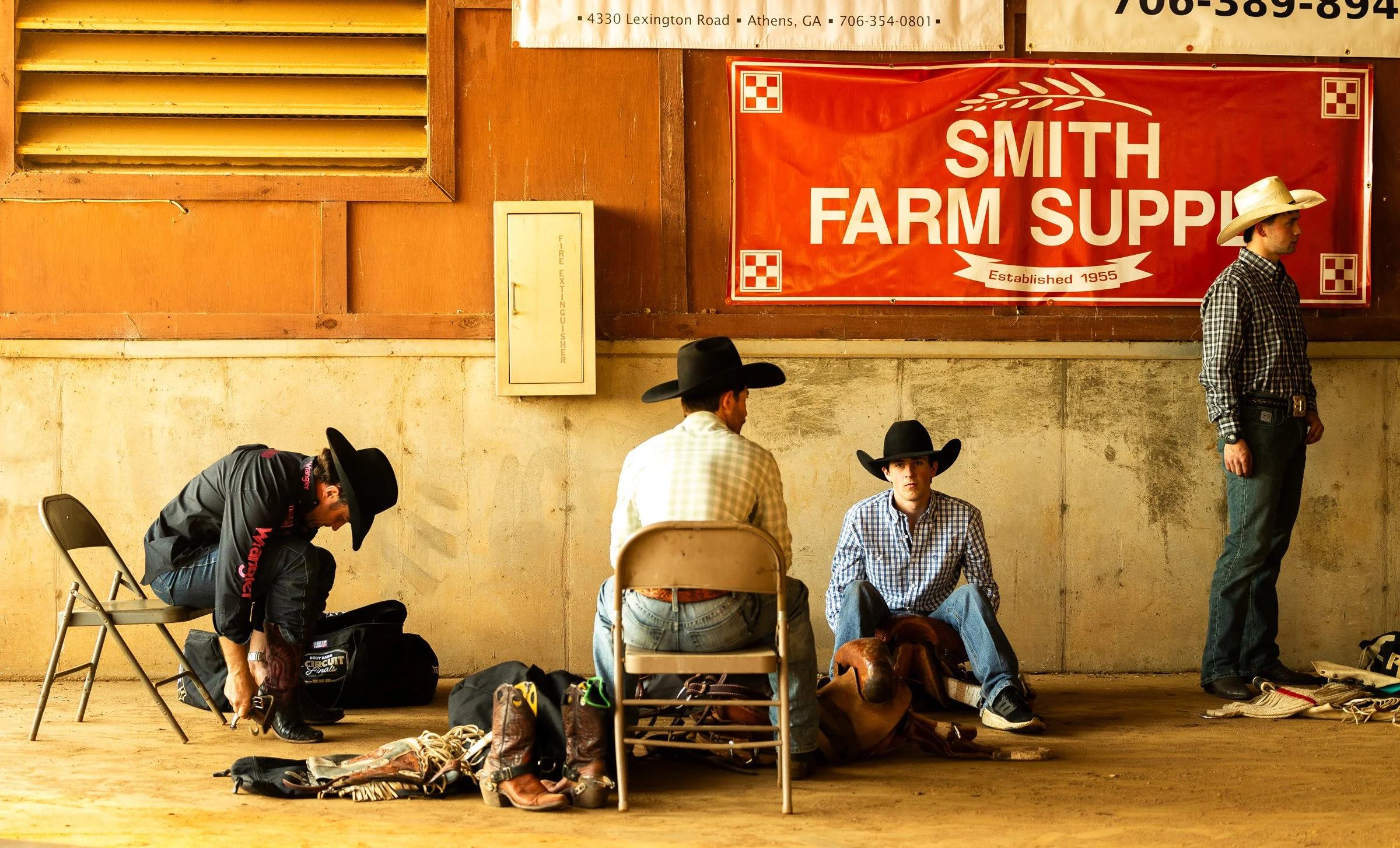 From left to right, Matt Smith, Jack Smithson, Caden Lowe and Gus Costello wait during the Great Southland Stampede Rodeo outside of the University of Georgia Livestock Instructional Arena in Athens, Georgia, on Saturday, March 21, 2026. Smith, Smith