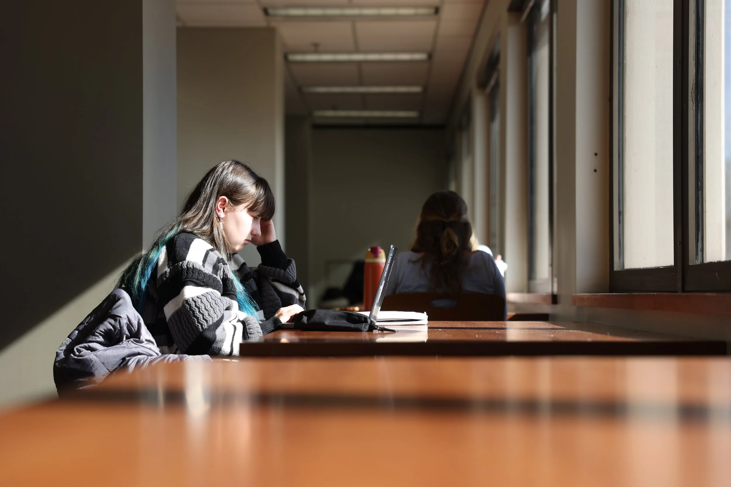 University of Georgia student, Kaitlyn Jennings, looks at her laptop during the first day of the 2026 University of Georgia spring semester in the University of Georgia Main Library on Monday, Jan. 12, 2026. Monday was the first day of classes for th