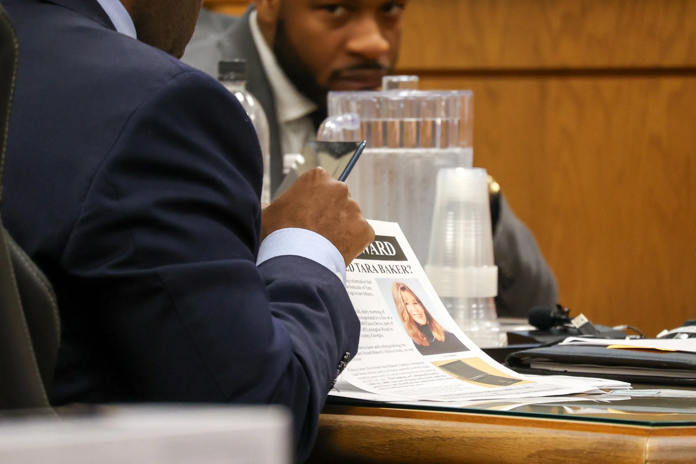 Defense Attorney Ahmad Crews flips through papers during the Tara Baker murder trial at the Athens-Clarke County Courthouse in Athens, Georgia, on Wednesday, Feb. 11, 2026. (Photo/Kaleb Tatum)