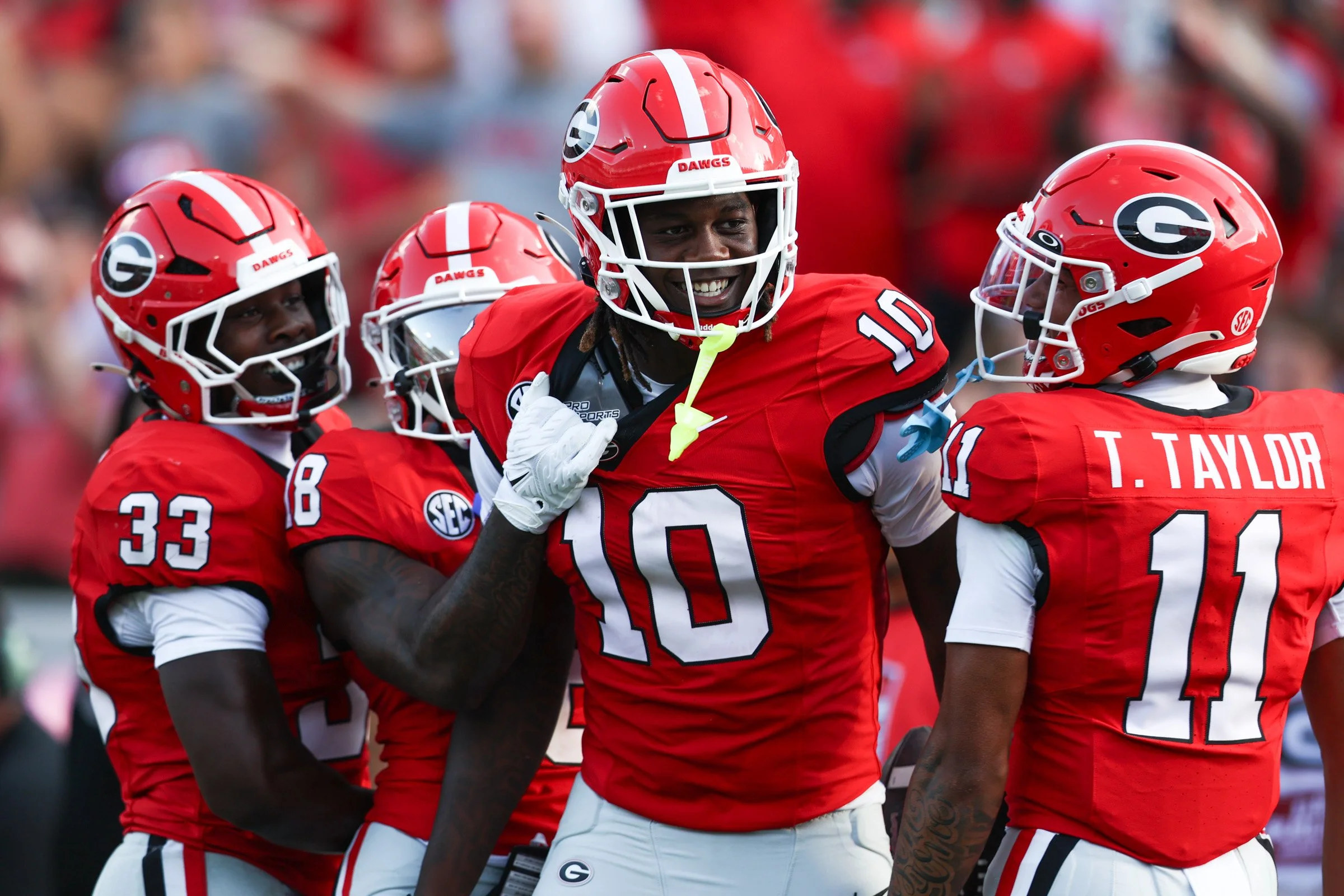 Georgia tight end Elyiss Williams (10) celebrates with teammate after scoring a touchdown during the opening home game against Marshall University at Sanford Stadium in Athens, Georgia, on Saturday, Aug. 30, 2025. (Photo/Kaleb Tatum)