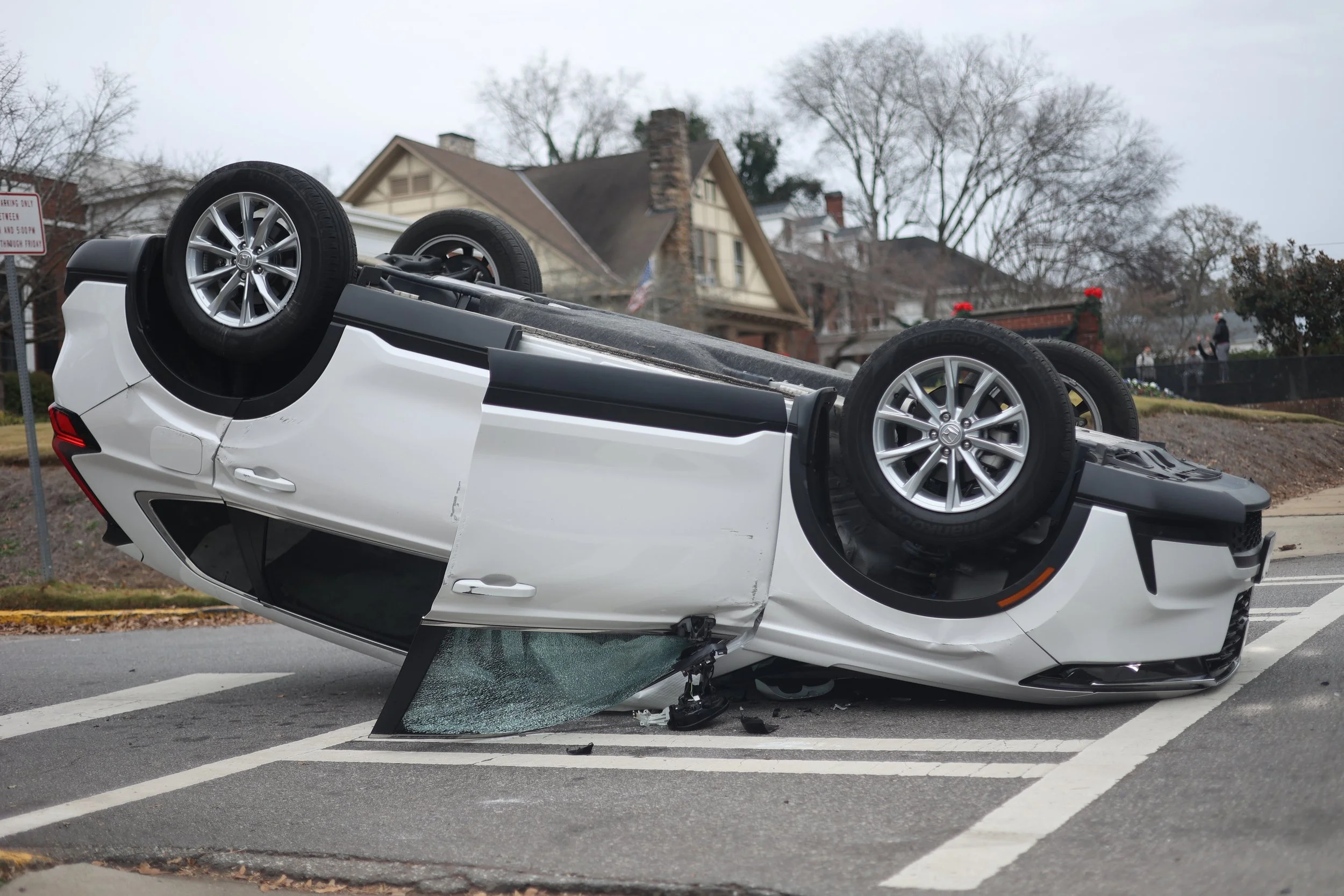 A car lays flipped over on Dearing Street in Athens, Georgia, on Thursday, Dec. 4, 2025. (Photo/ Kaleb Tatum)